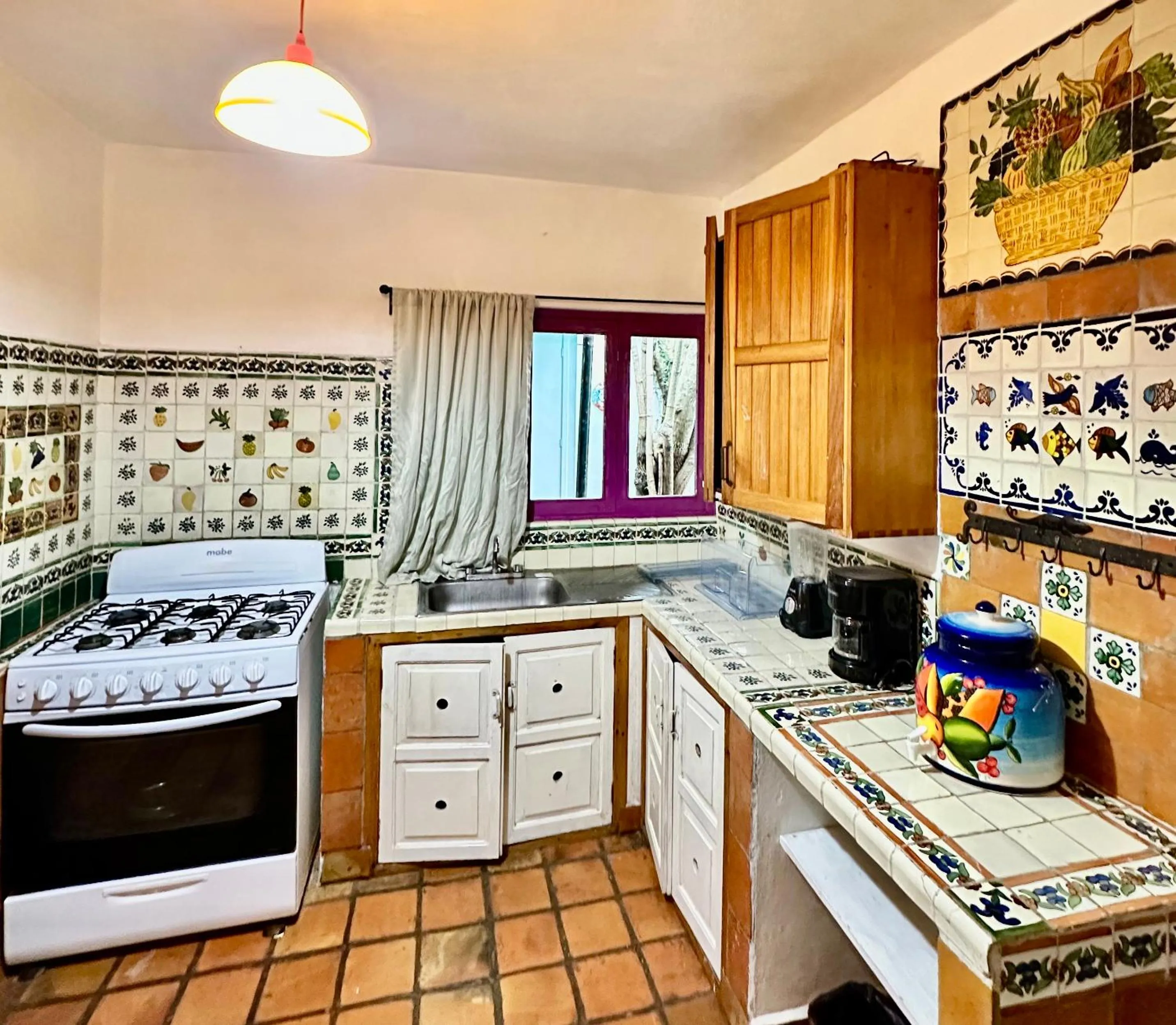 Kitchen or kitchenette in La Etelvina Suites