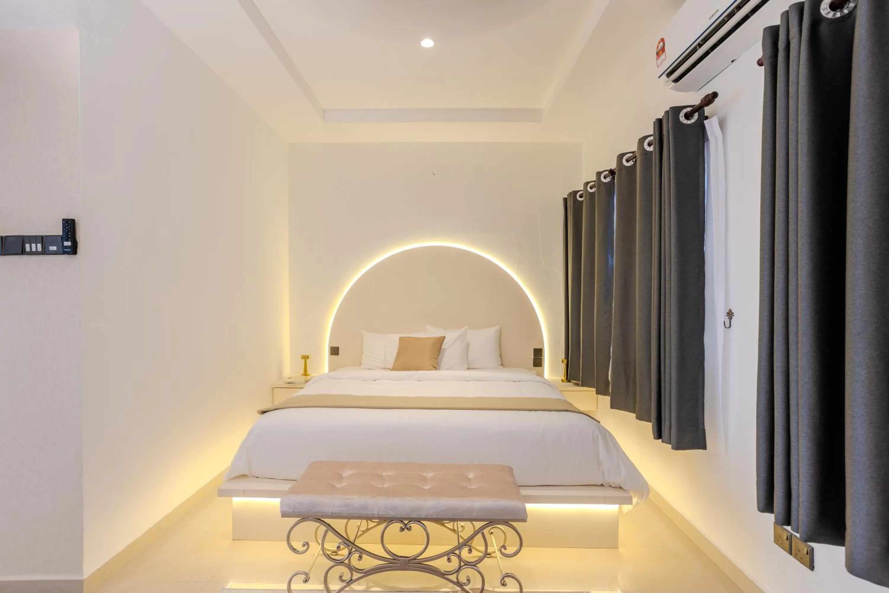 Bed in Suntai Villa, Beachfront Suites