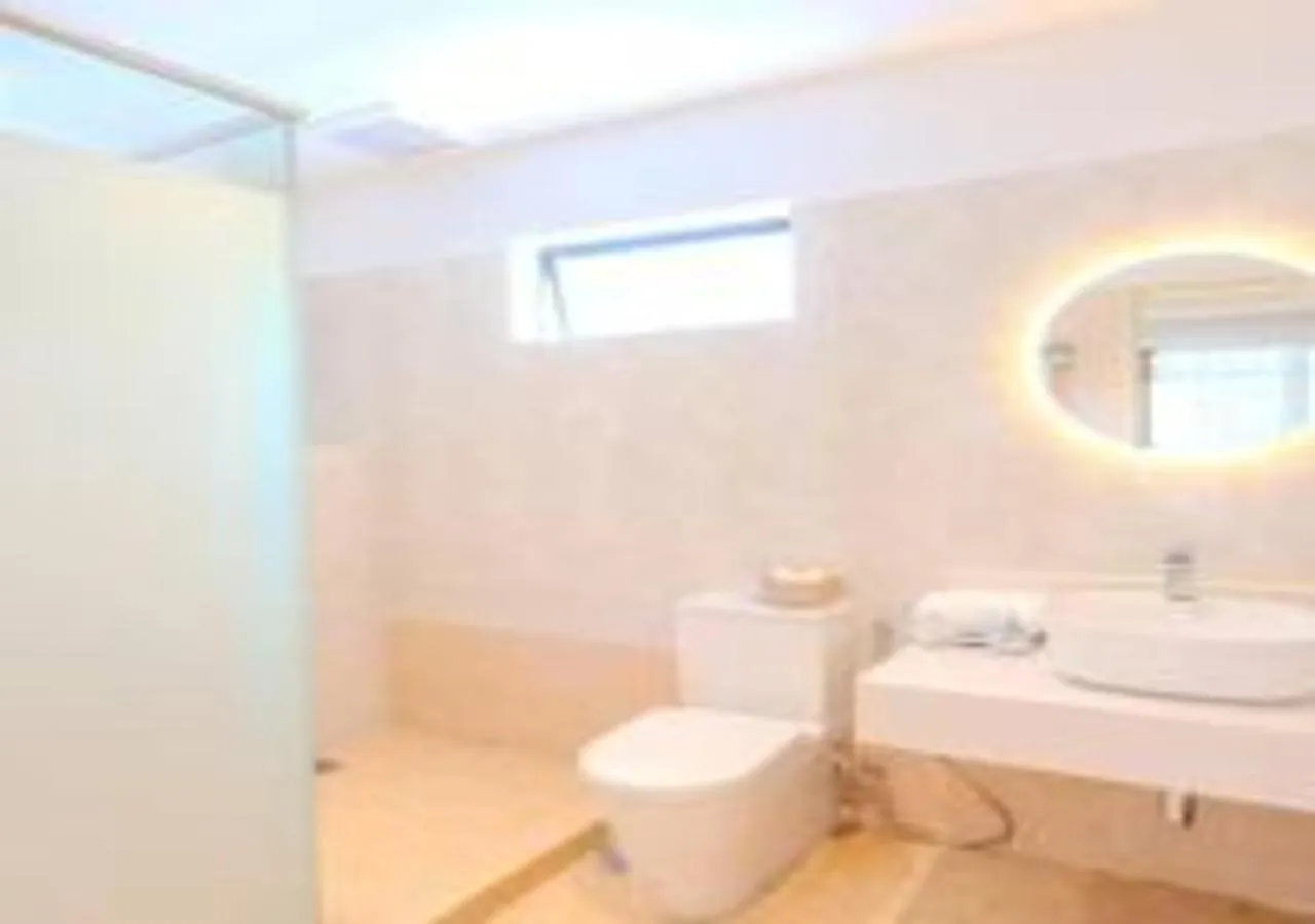 Bathroom in Suntai Villa, Beachfront Suites