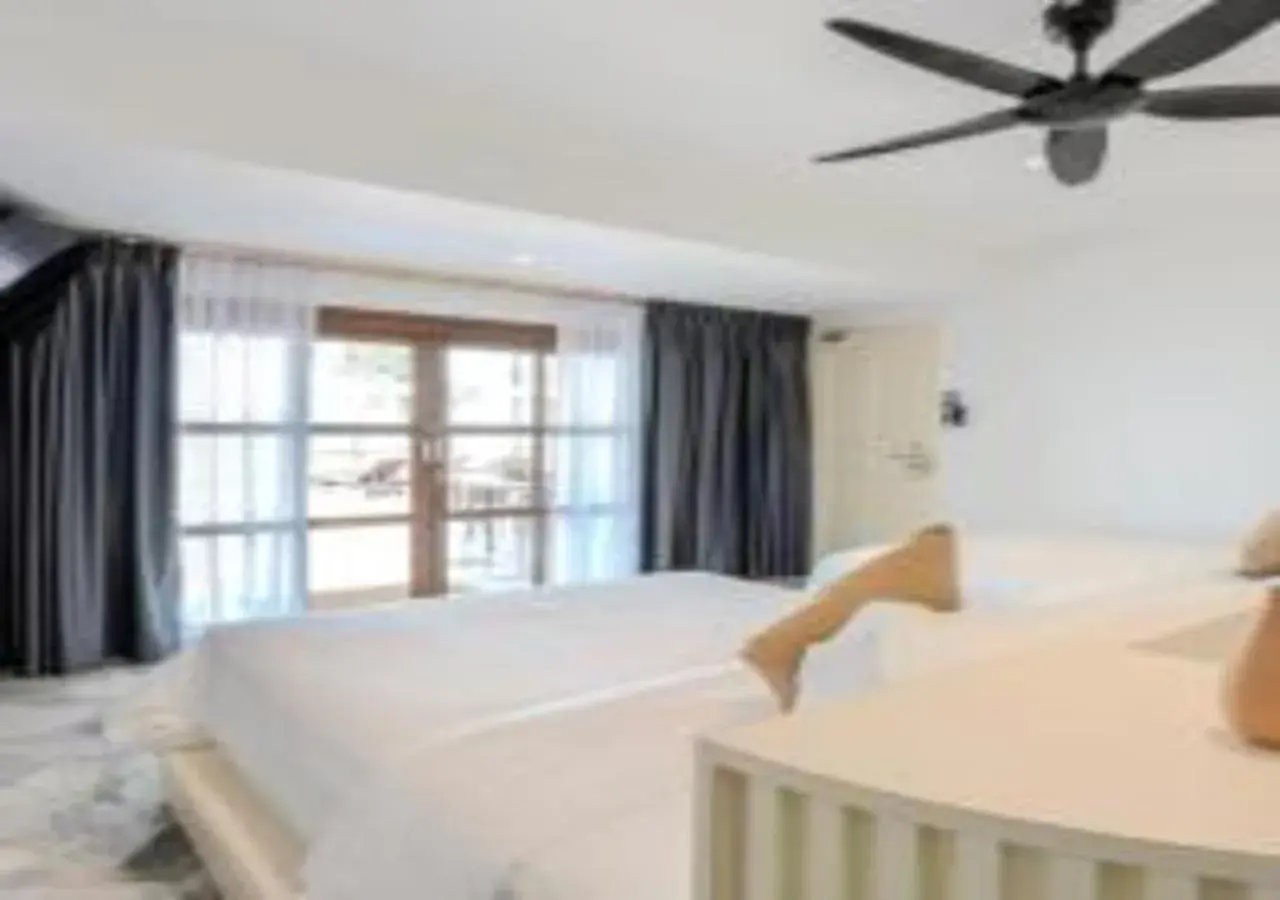 Bed in Suntai Villa, Beachfront Suites Bed in Suntai Villa, Beachfront Suites