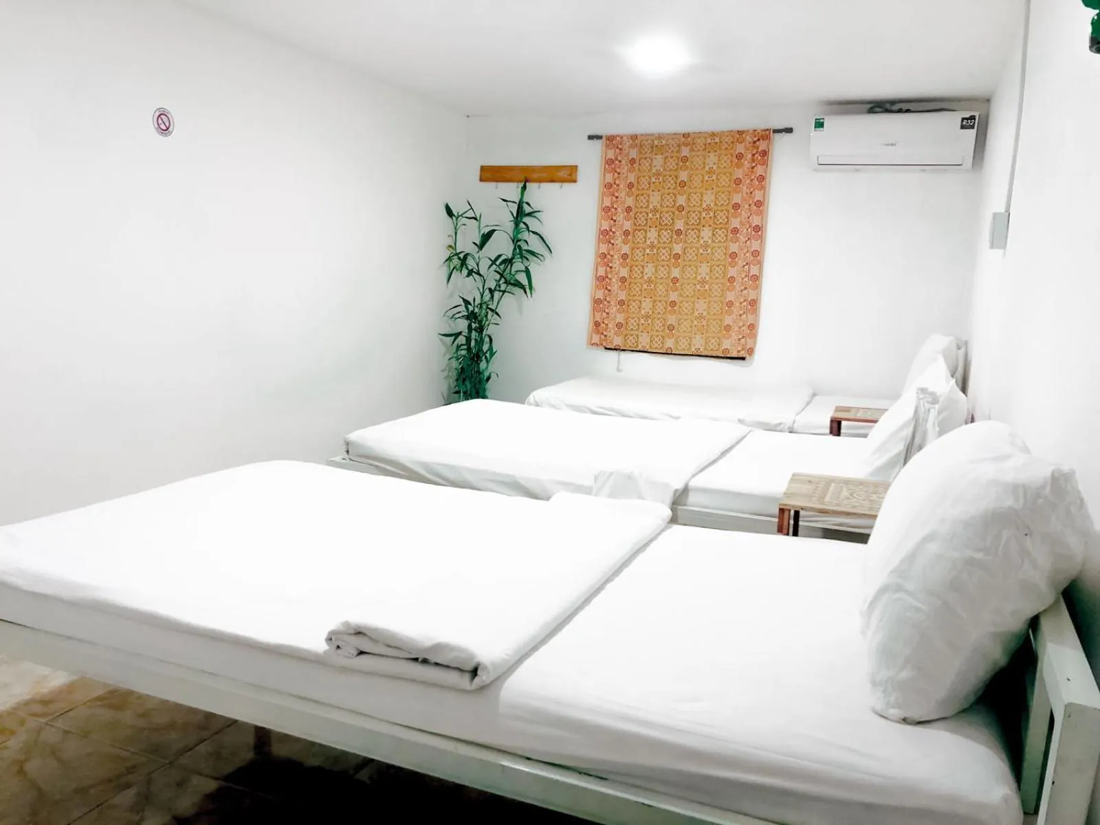 Bed in Tingkham Guesthouse