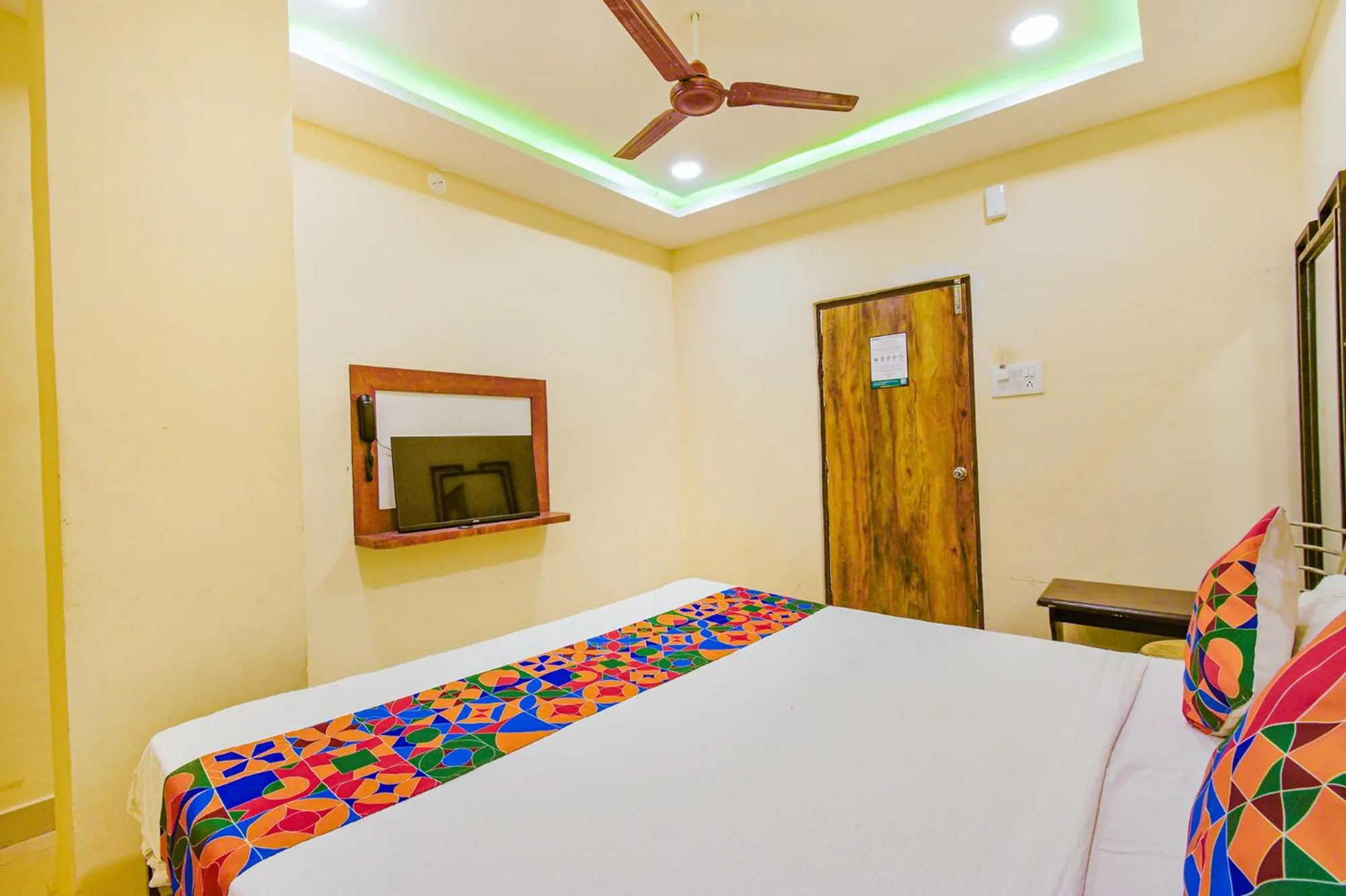 Bed in FabHotel Yogeshwara Grand - Nr Hyderabad International Airport, Shamshabad