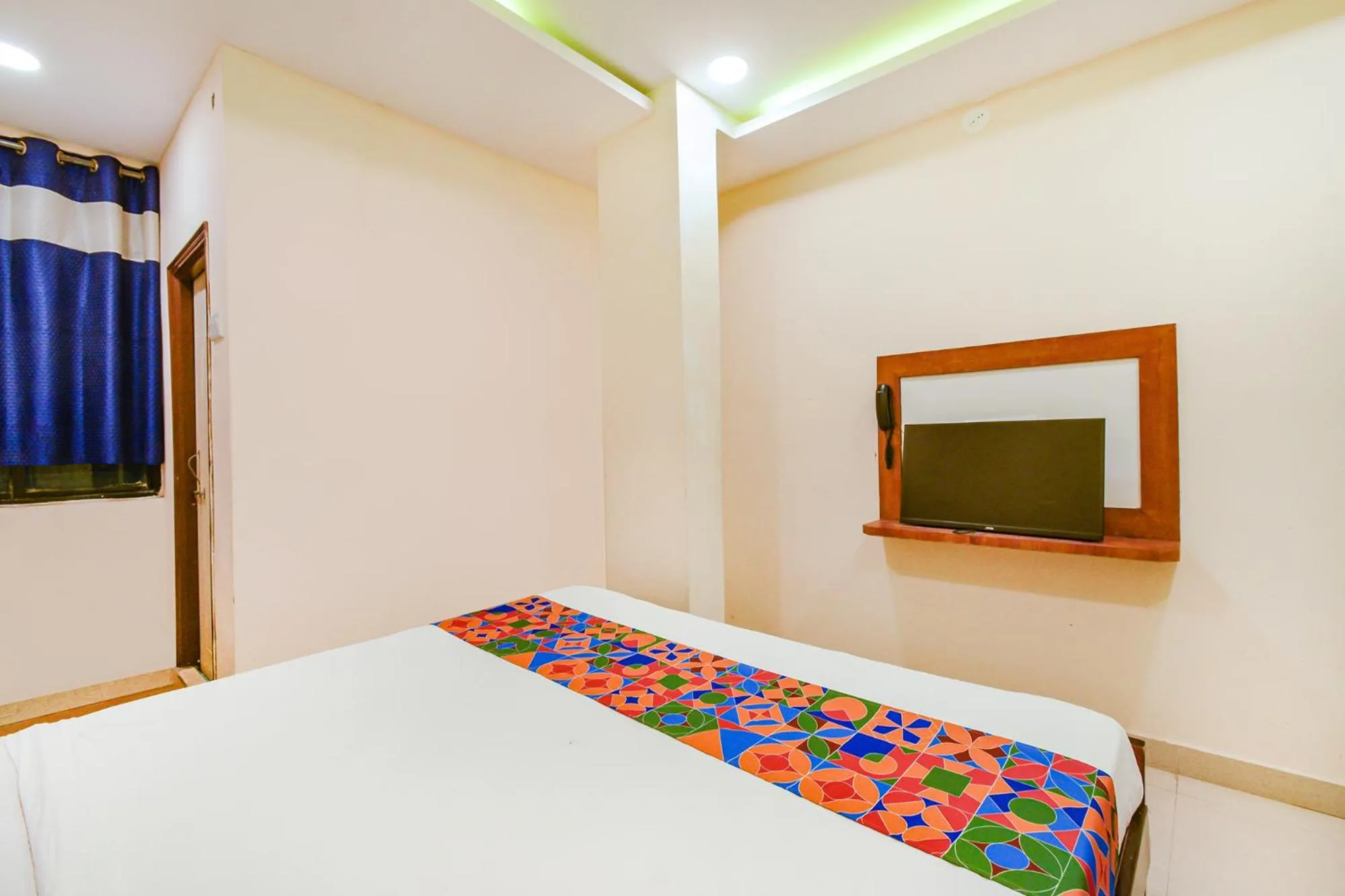 Bed in FabHotel Yogeshwara Grand - Nr Hyderabad International Airport, Shamshabad