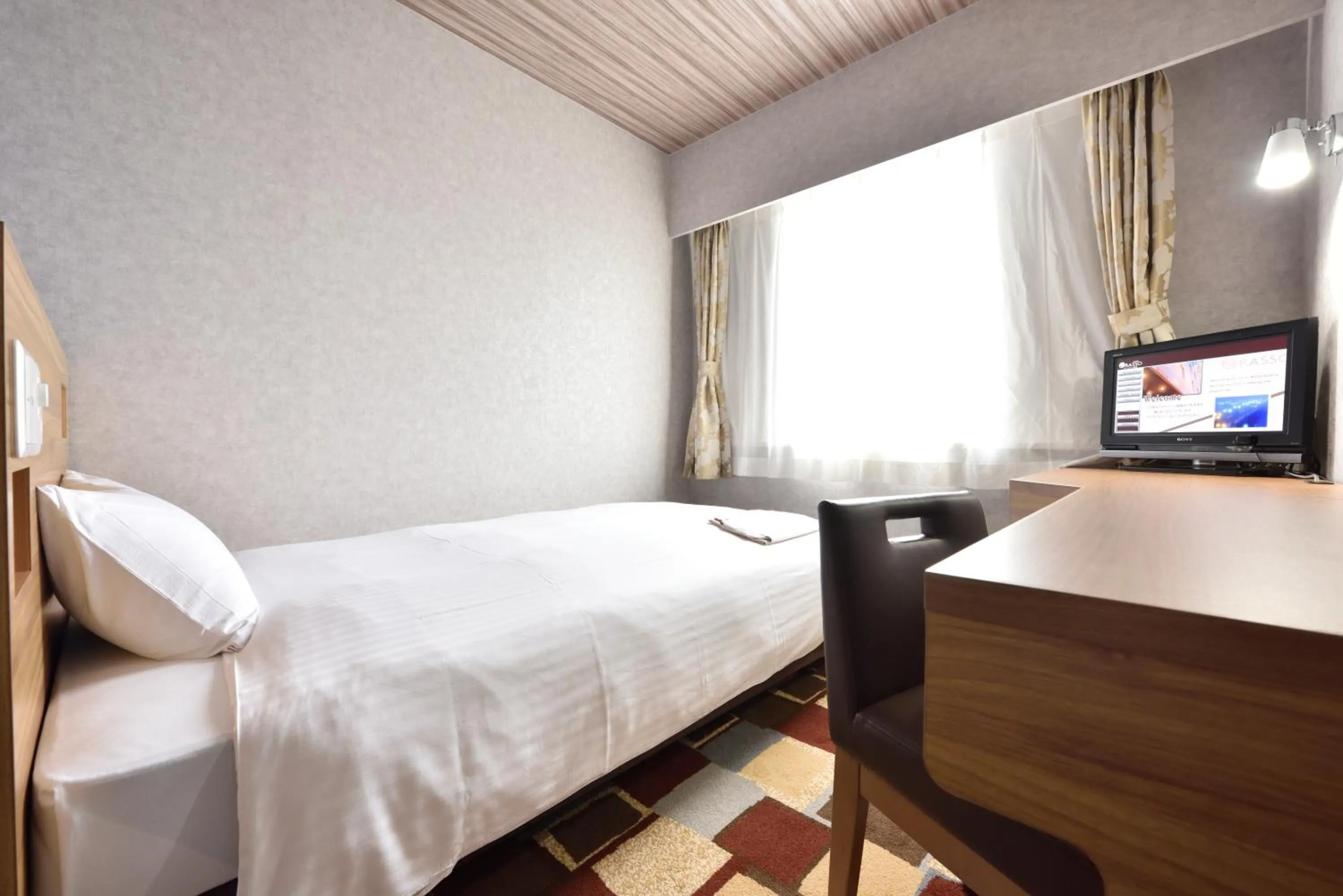 Photo of the whole room, Bed in Smile Hotel Kushiro