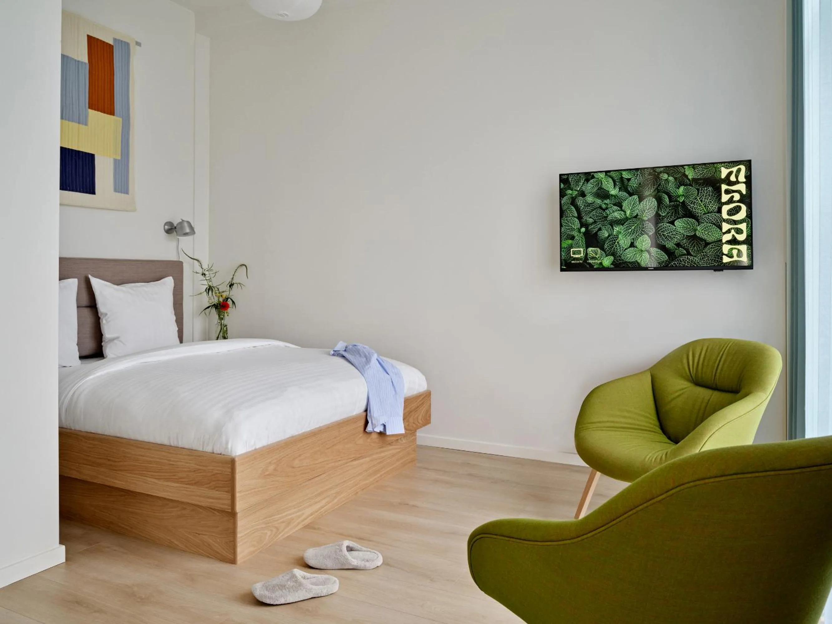 Bed in Flora Apartment Hotel