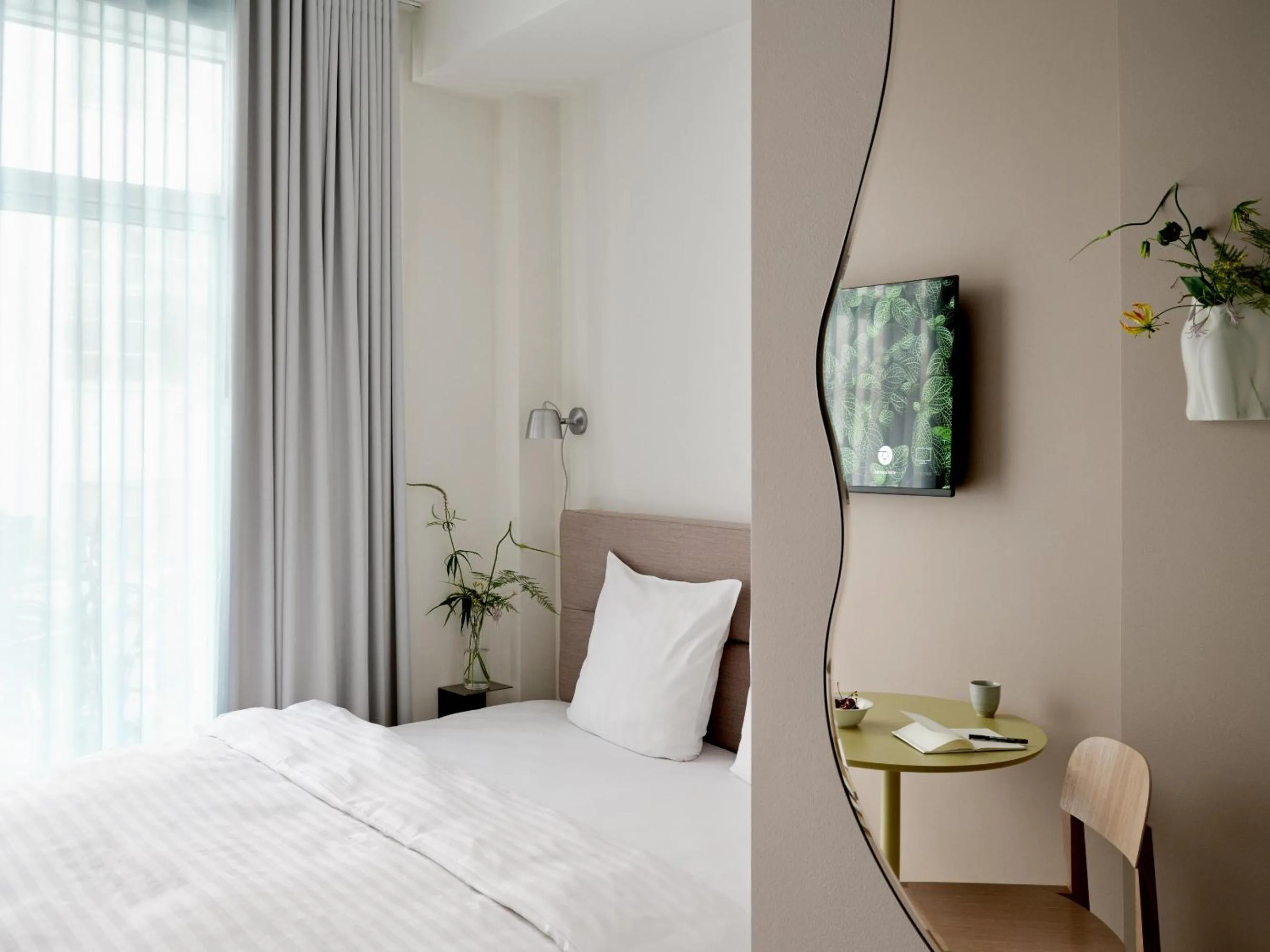 Bed in Flora Apartment Hotel