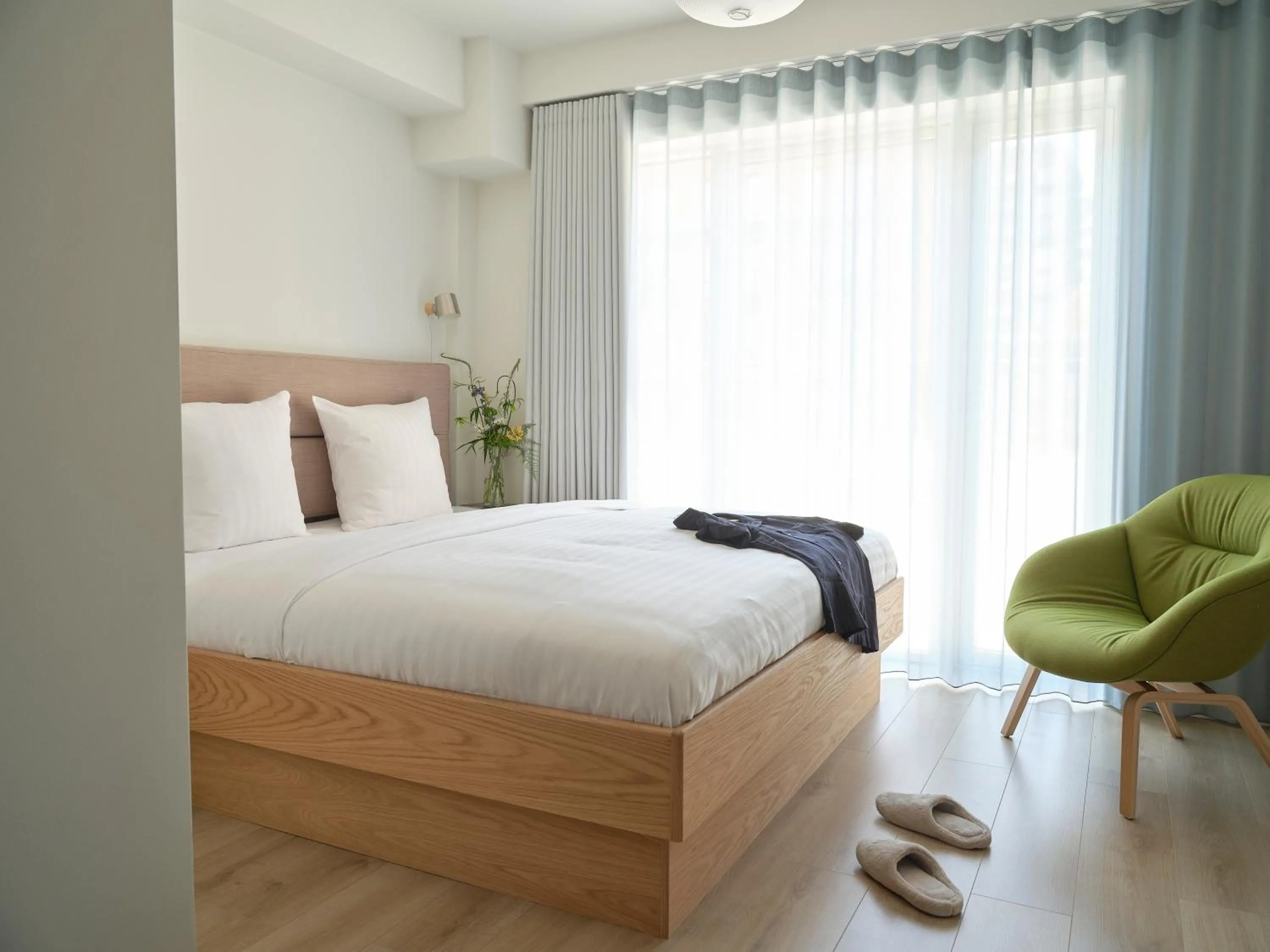 Bed in Flora Apartment Hotel