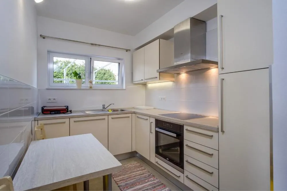 Kitchen or kitchenette in Apartments Josipa
