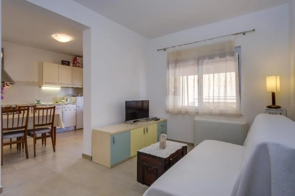 Kitchen or kitchenette, Bed in Apartments Josipa