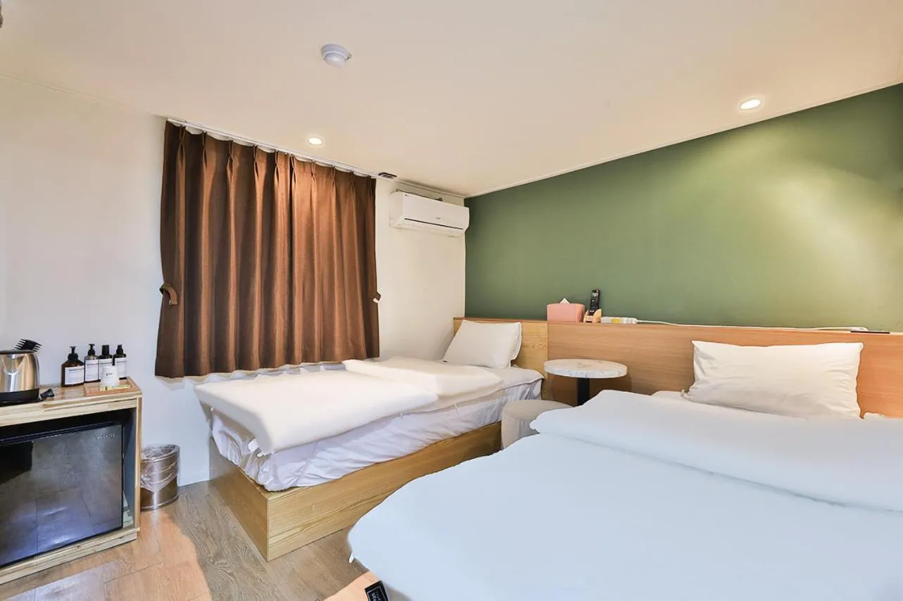 Bed in No 25 Hotel Namyangju Bukhan River