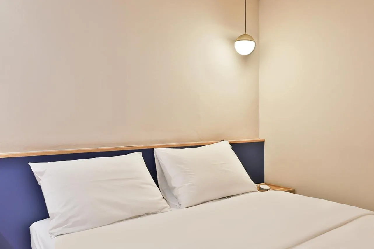 Bed in No 25 Hotel Namyangju Bukhan River