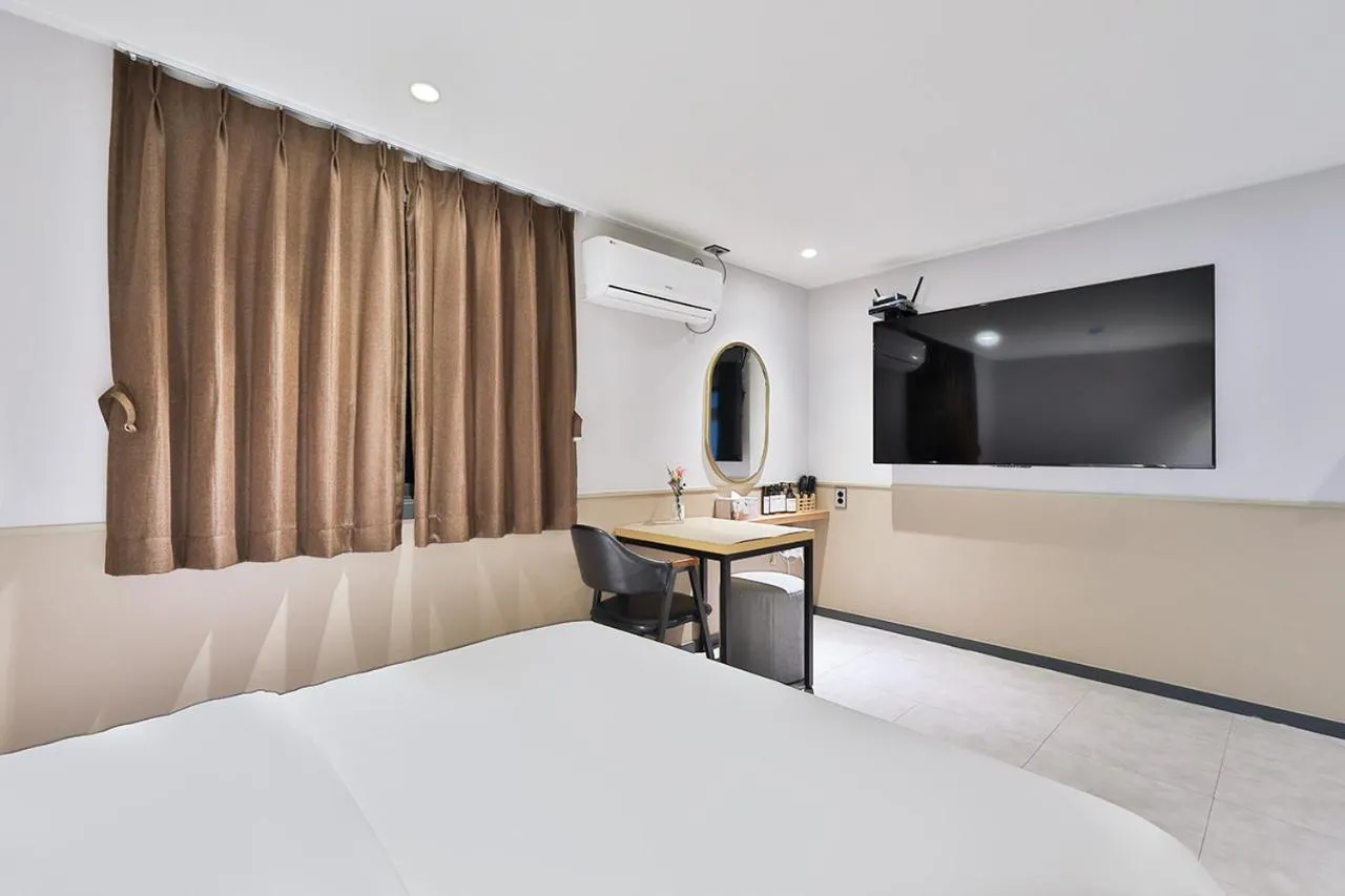 Bed in No 25 Hotel Namyangju Bukhan River