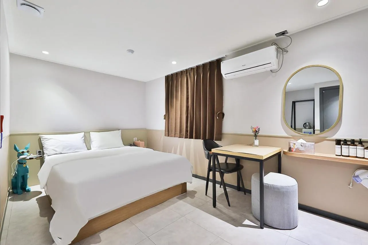 Bed in No 25 Hotel Namyangju Bukhan River