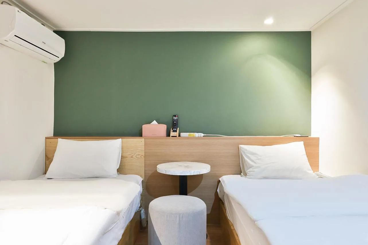 Bed in No 25 Hotel Namyangju Bukhan River