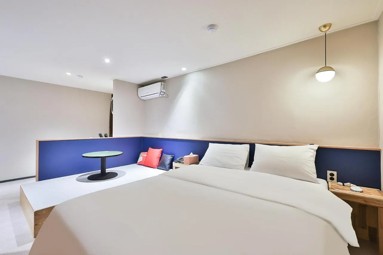 Bed in No 25 Hotel Namyangju Bukhan River