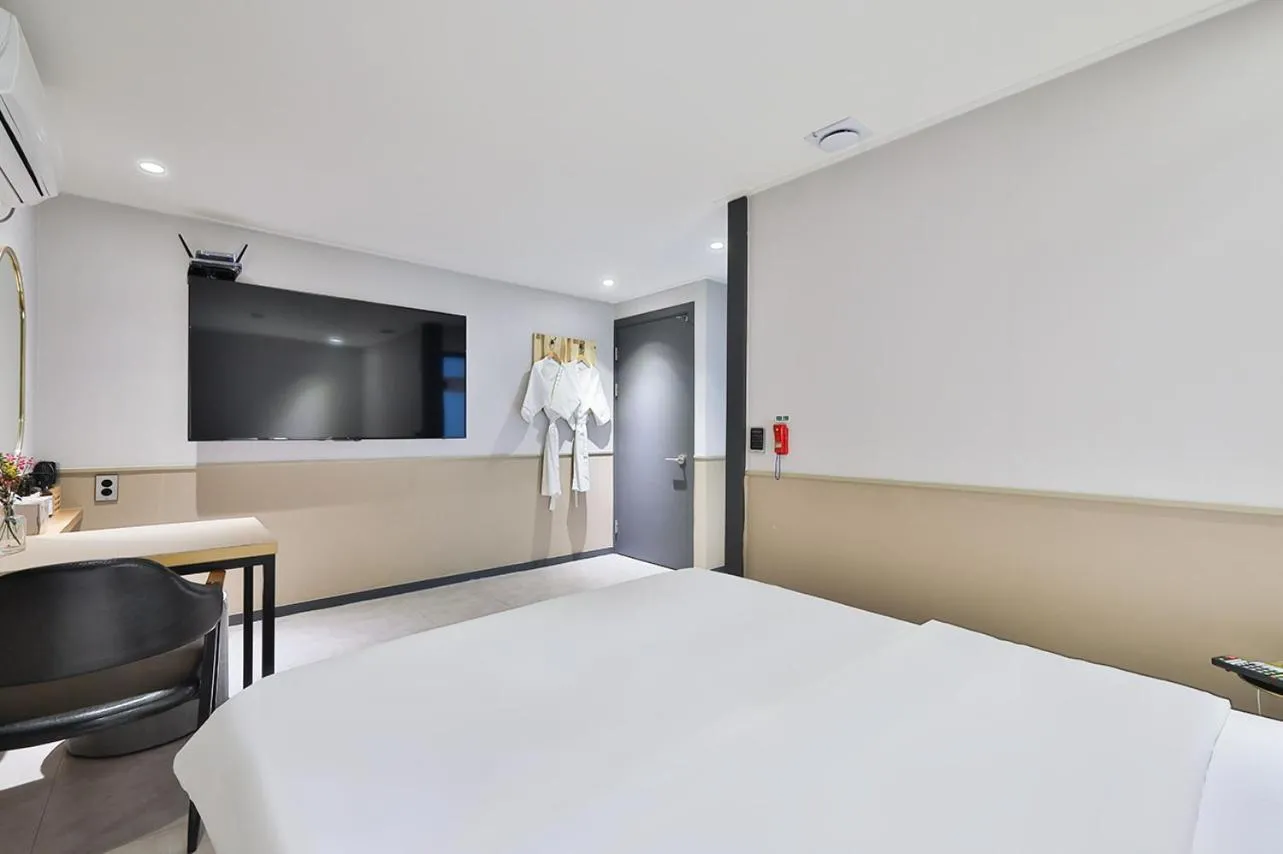 Bed in No 25 Hotel Namyangju Bukhan River