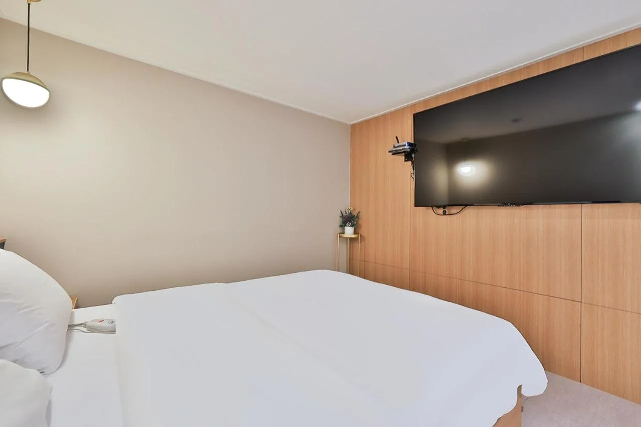 Bed in No 25 Hotel Namyangju Bukhan River