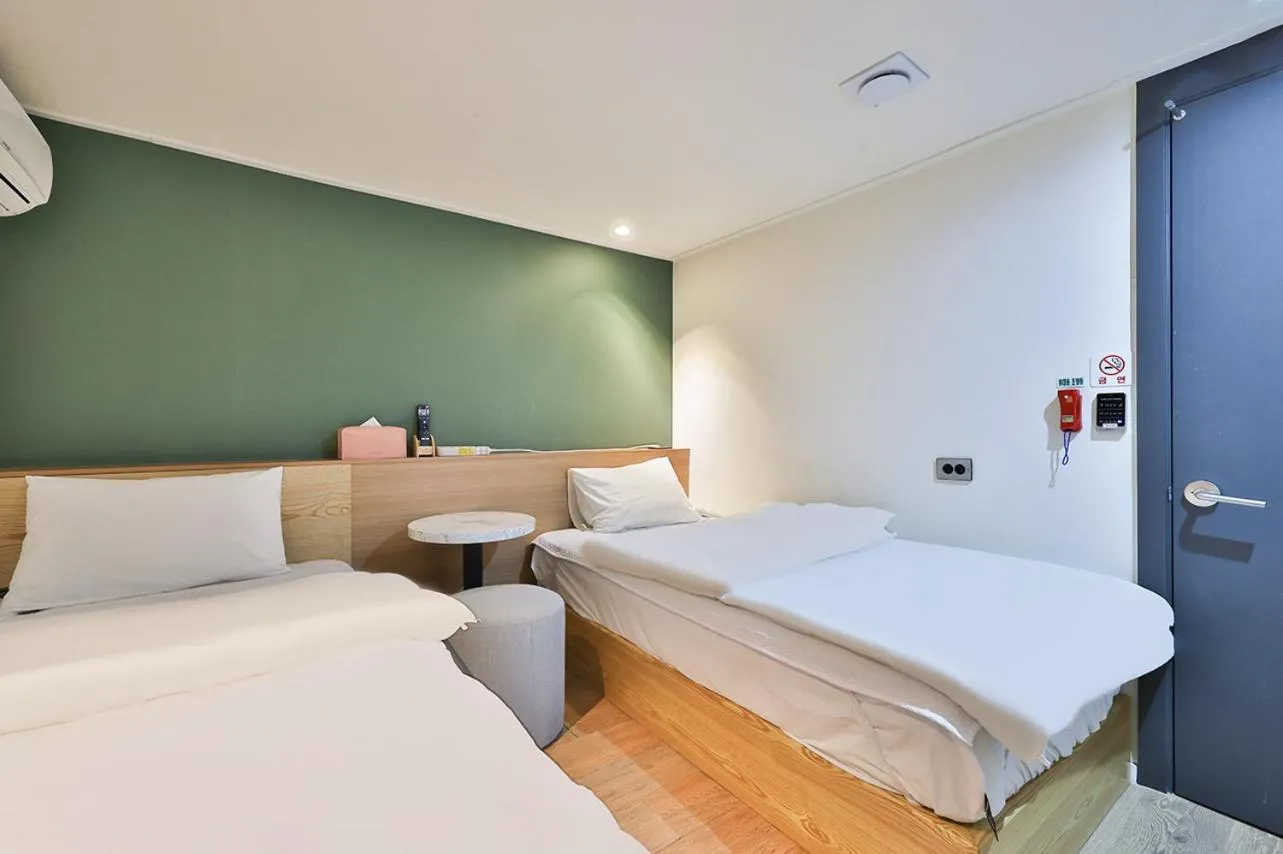 Bed in No 25 Hotel Namyangju Bukhan River