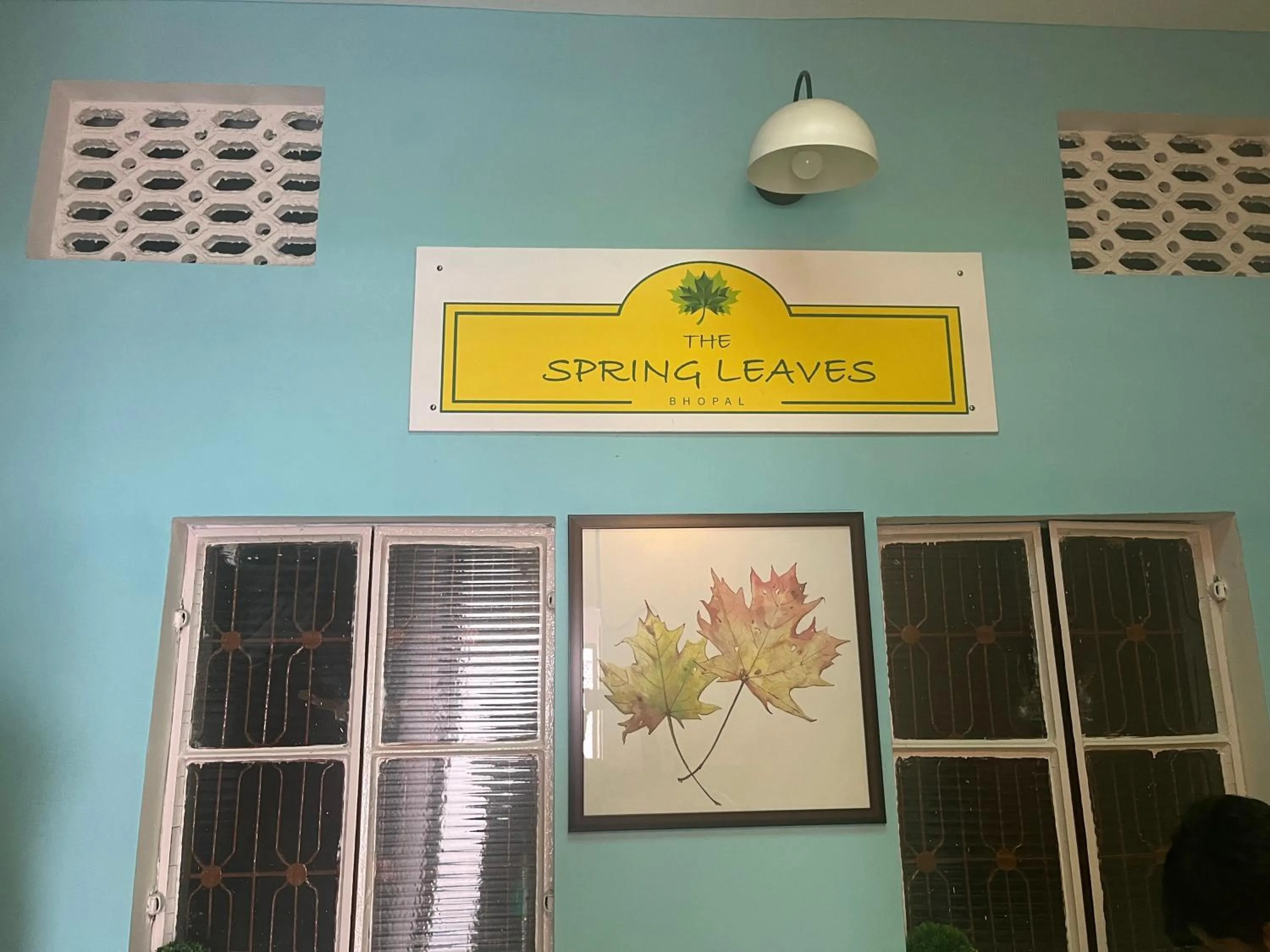 Property logo or sign in The Spring Leaves