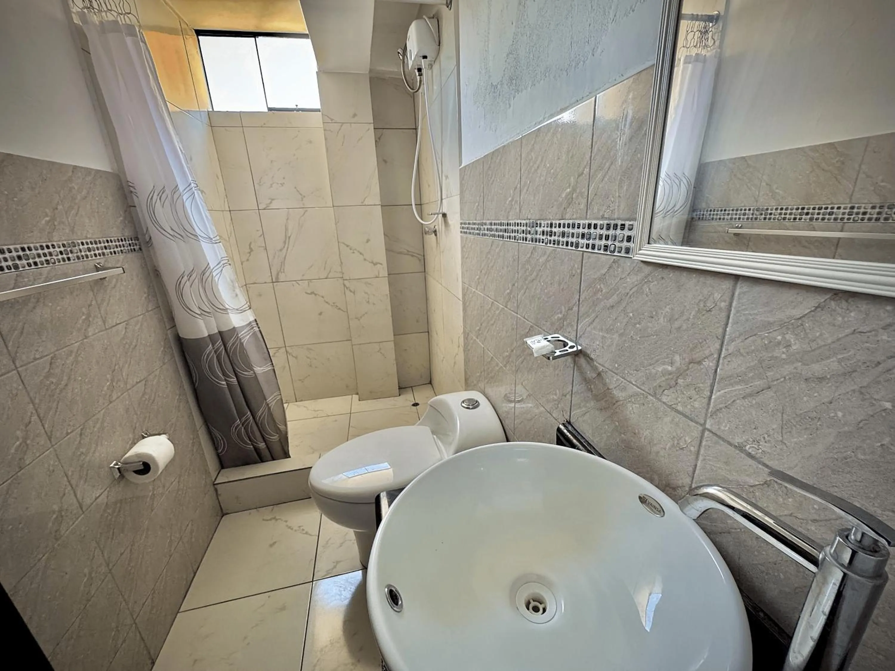 Shower in Apu Wasi