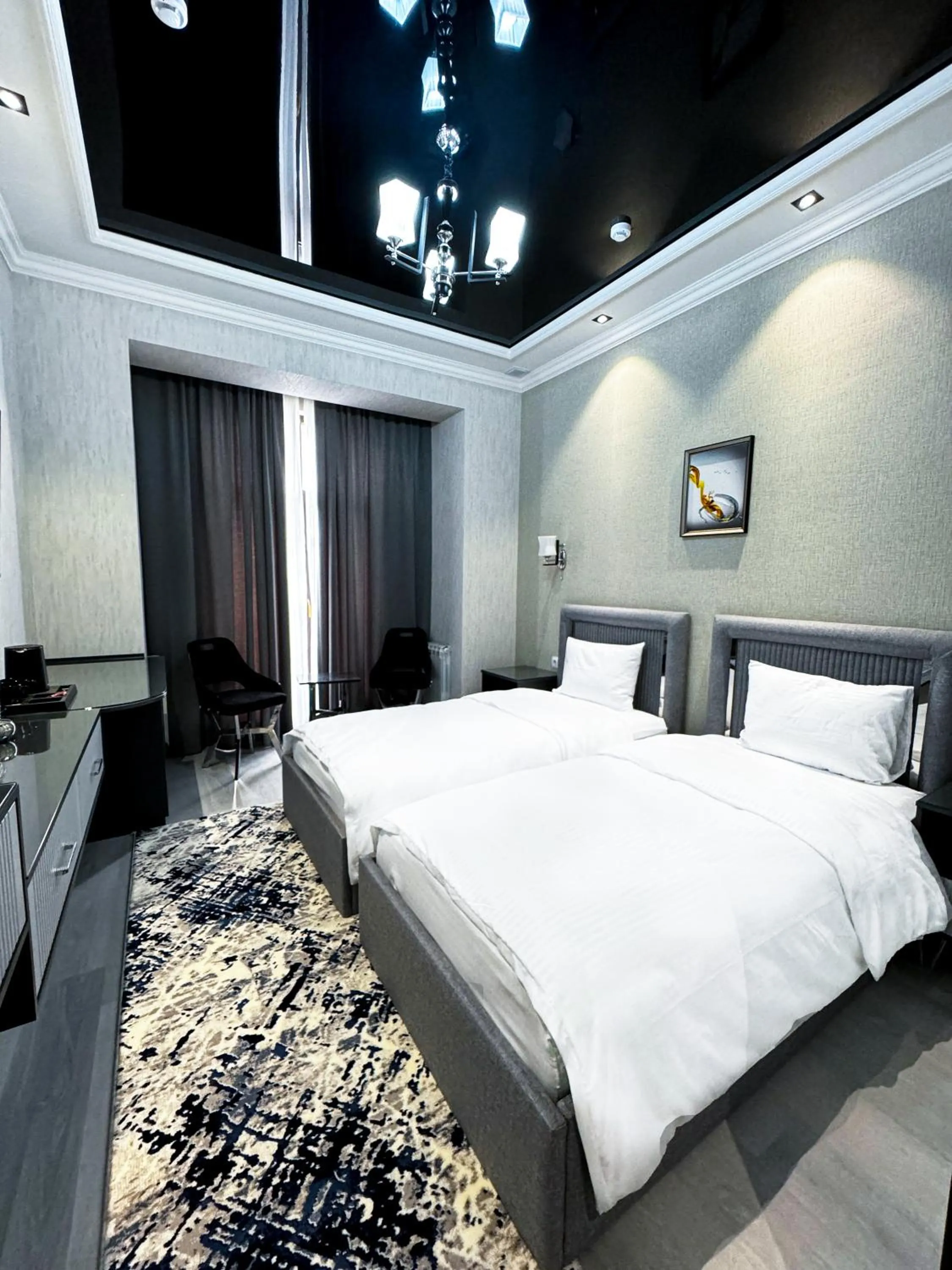 Bed in De Villa Hotel