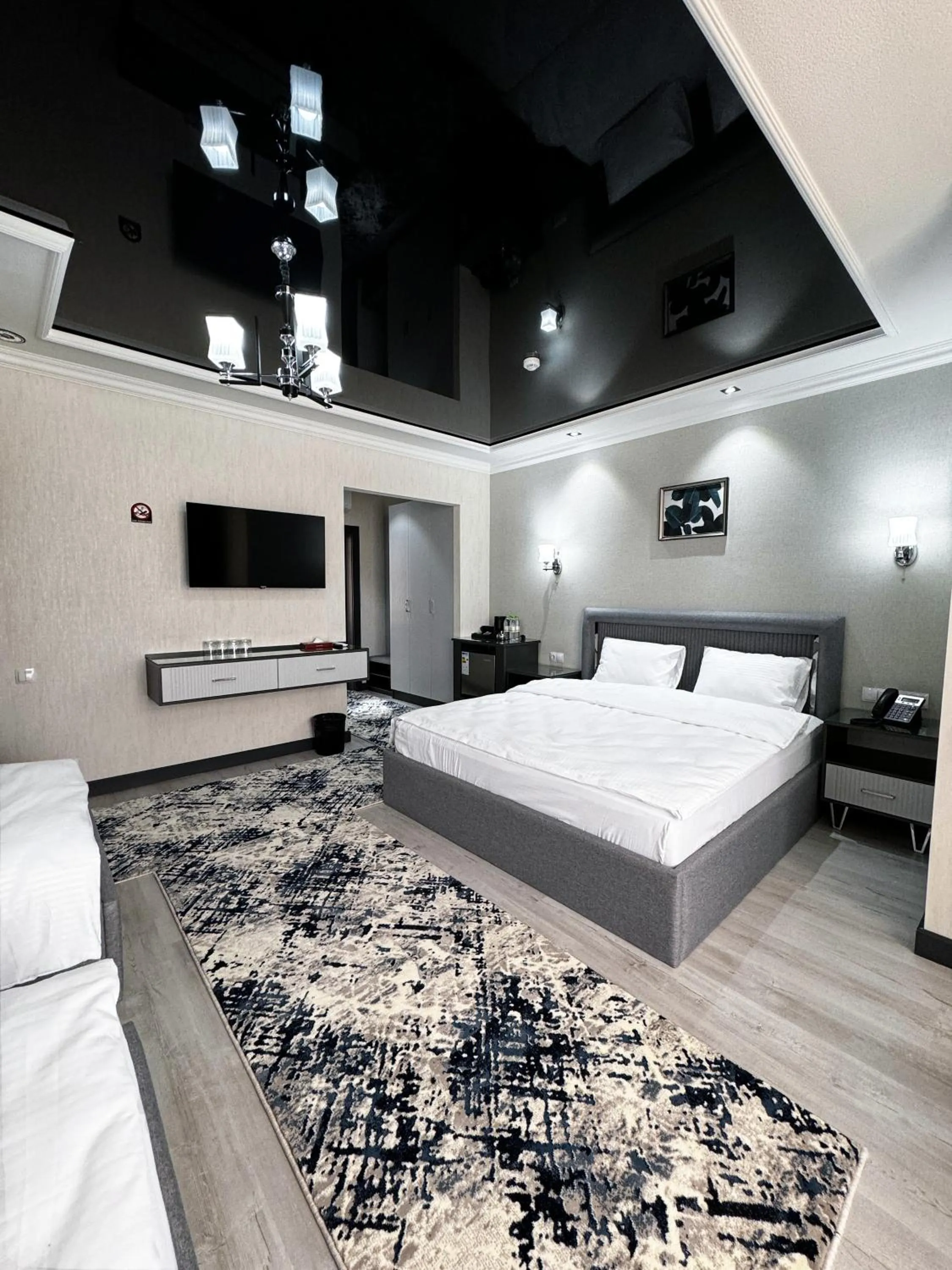 Bed in De Villa Hotel