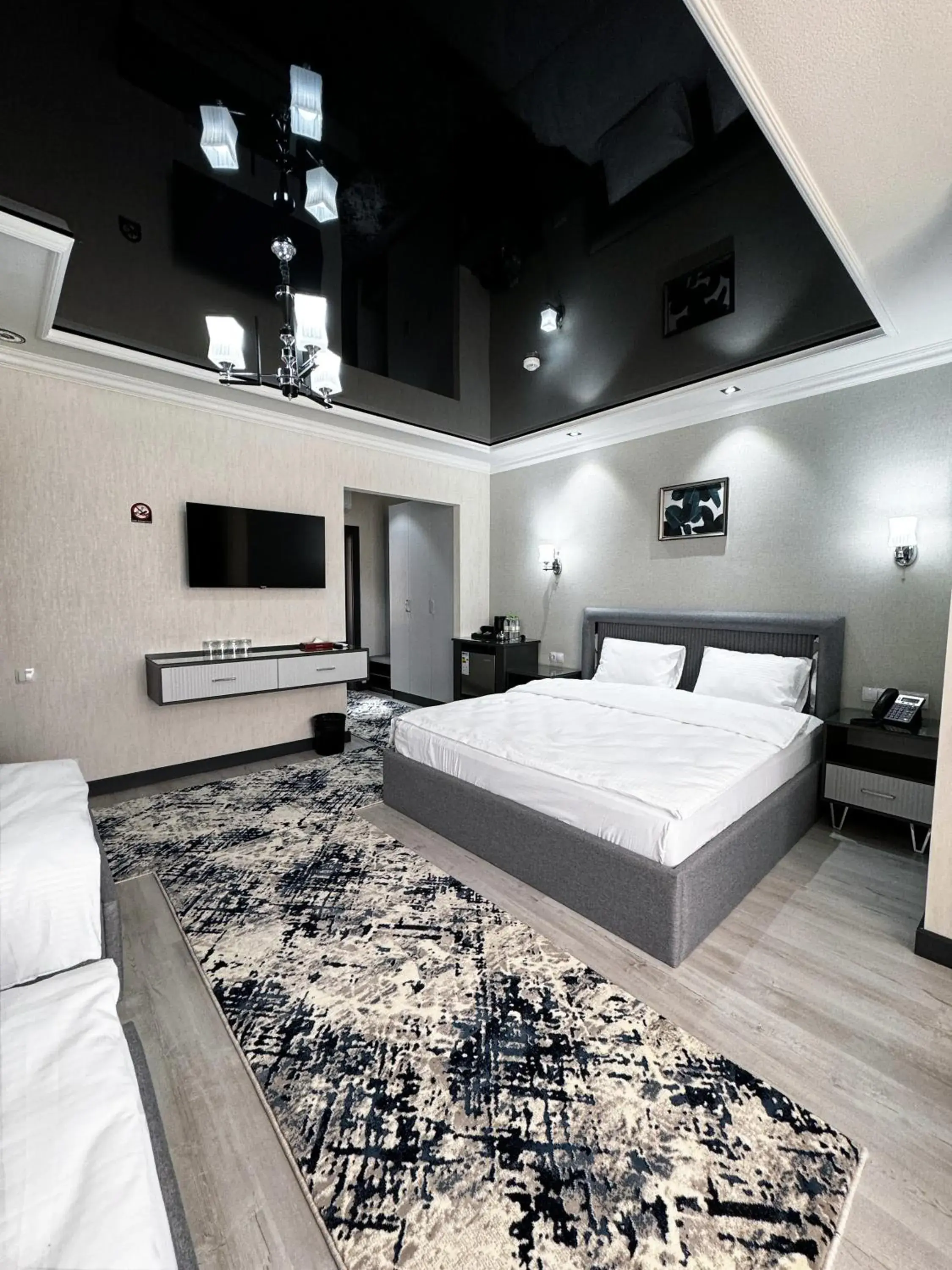 Quadruple Room with Balcony in De Villa Hotel Quadruple Room with Balcony in De Villa Hotel