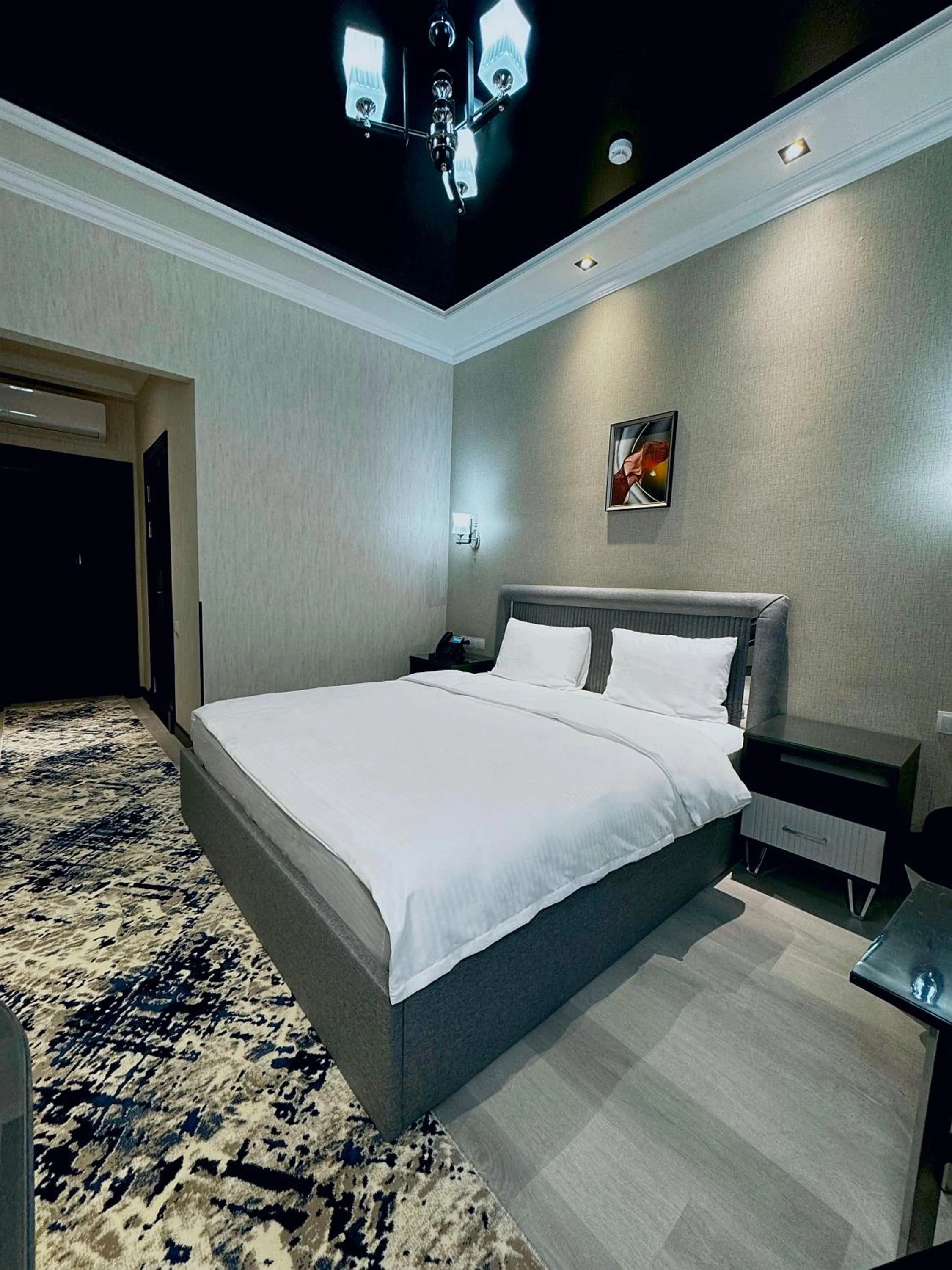 Bed in De Villa Hotel