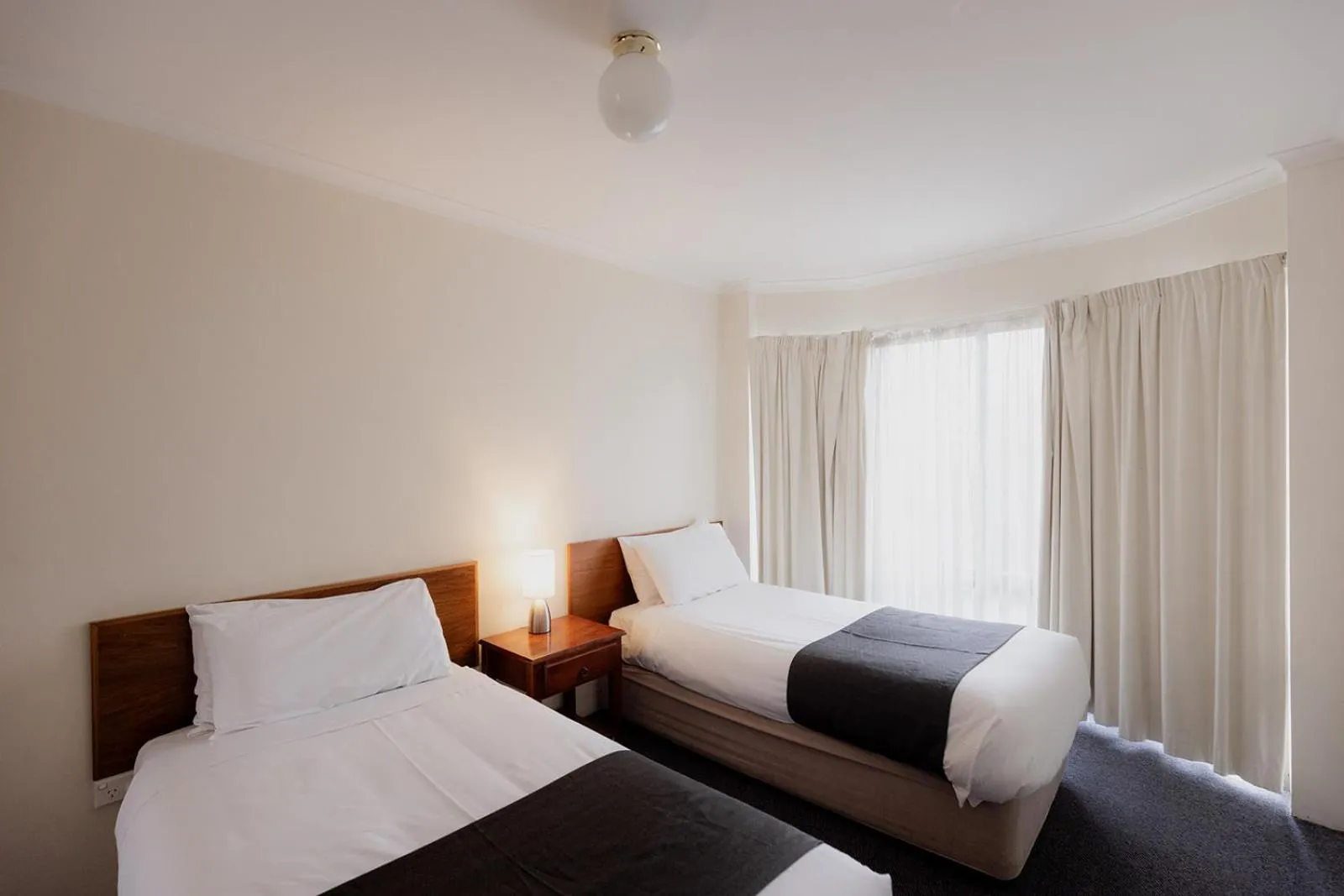 Bed in Argyle Motor Lodge