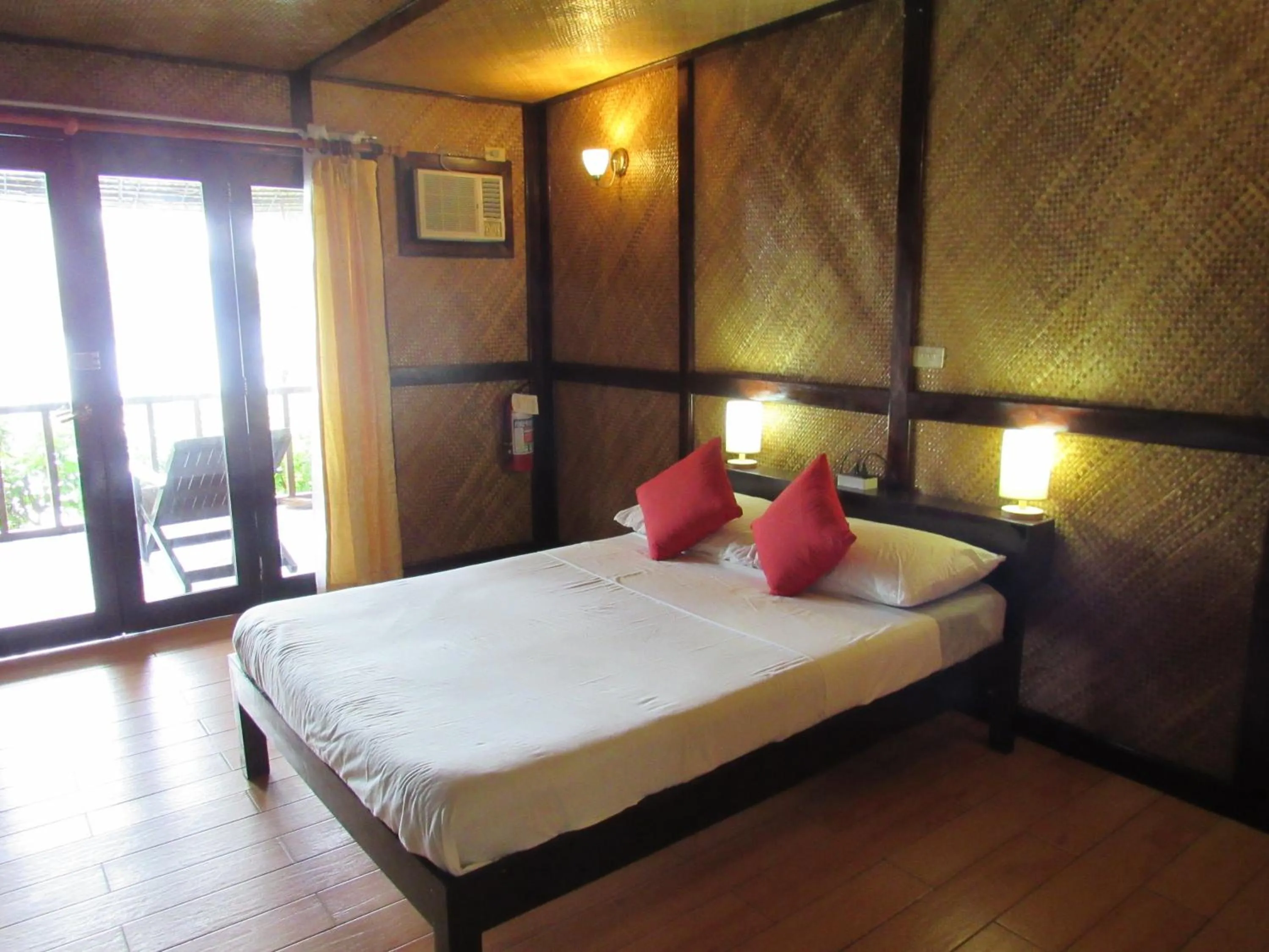 Property building, Bed in DACOZY Beach Resort