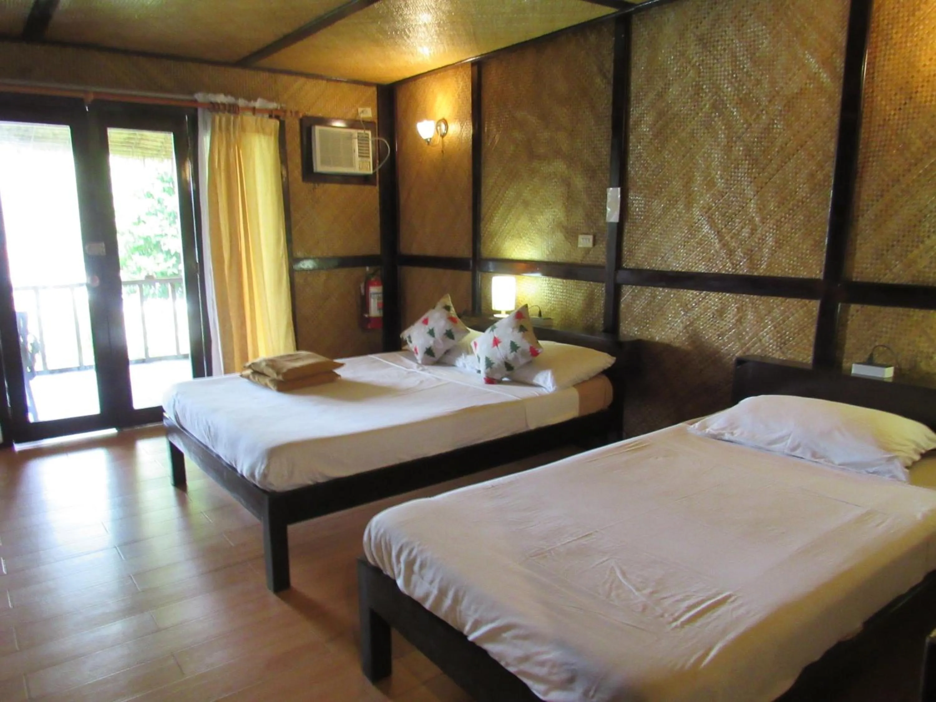 Property building, Bed in DACOZY Beach Resort