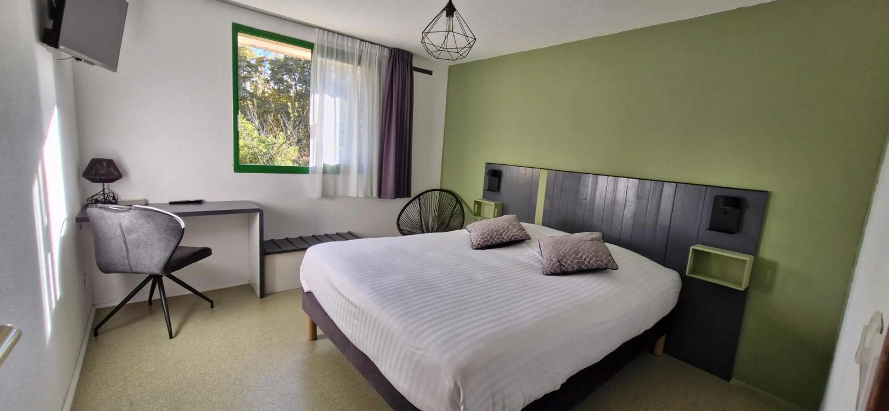 Bed in N'Atura Hôtel