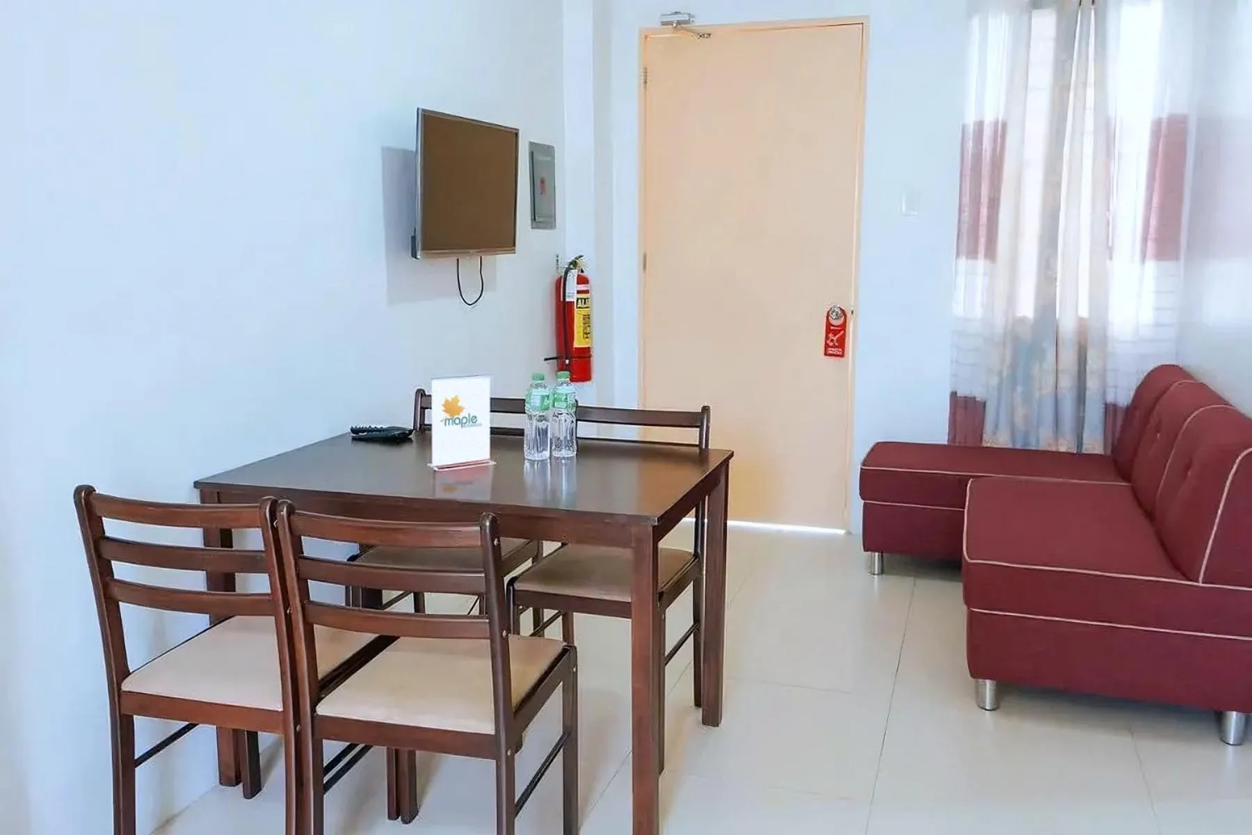 Communal lounge/ TV room in MMaple Residences Talisay