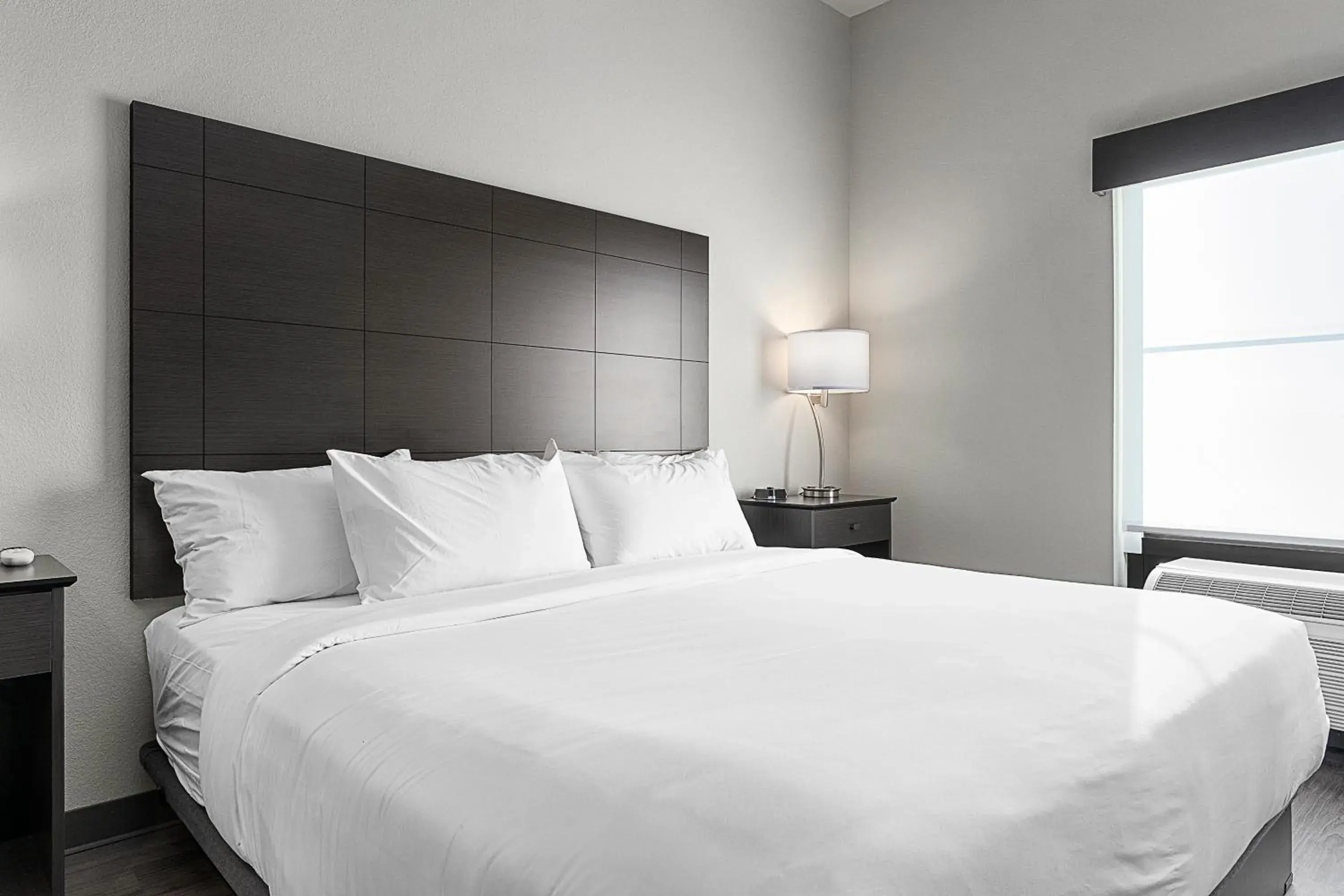 Bedroom, Bed in Riverstone Suites by Cobblestone Hotels - Chippewa Falls Bedroom, Bed in Riverstone Suites by Cobblestone Hotels - Chippewa Falls