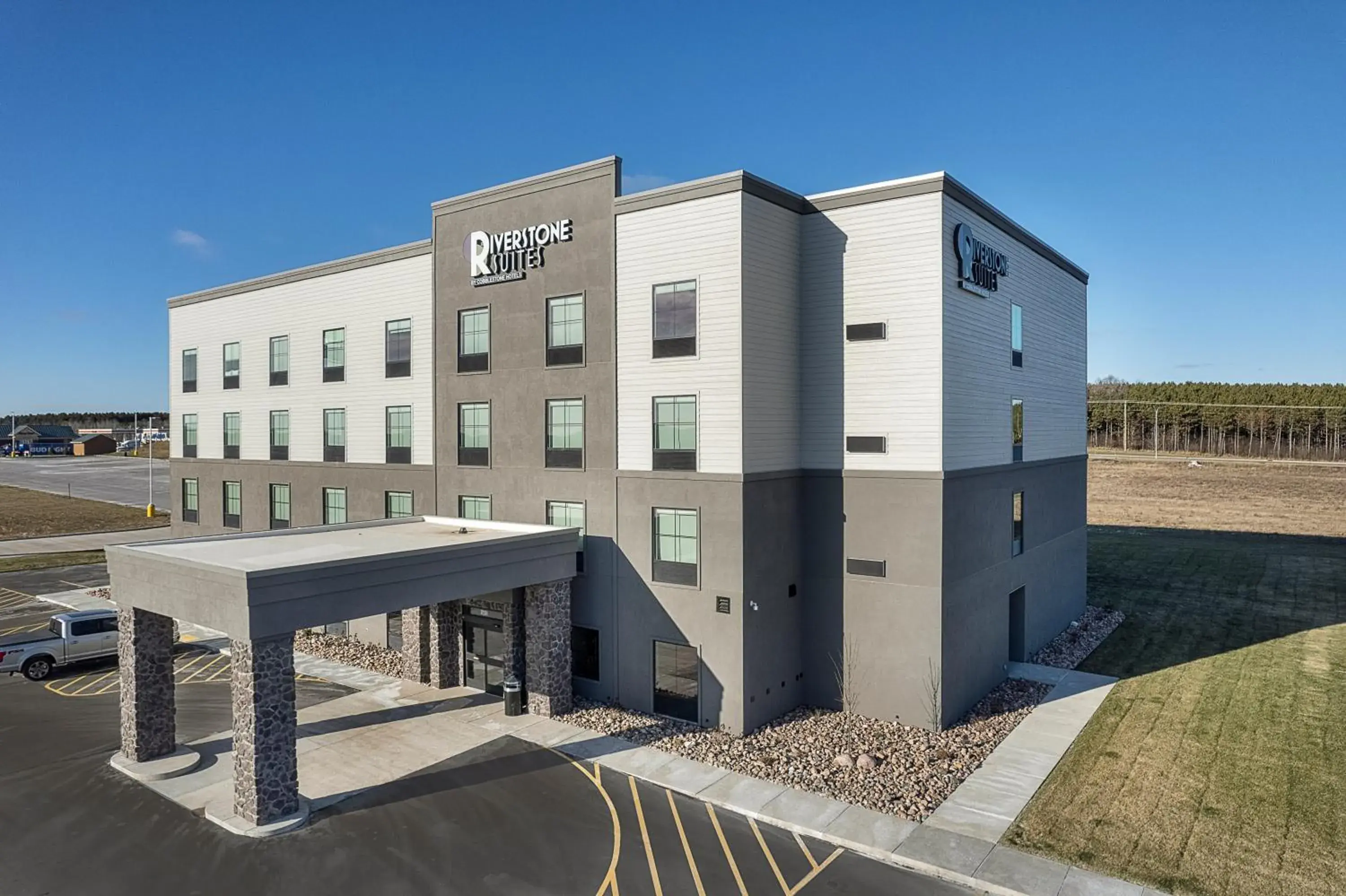 Property building in Riverstone Suites by Cobblestone Hotels - Chippewa Falls Property building in Riverstone Suites by Cobblestone Hotels - Chippewa Falls