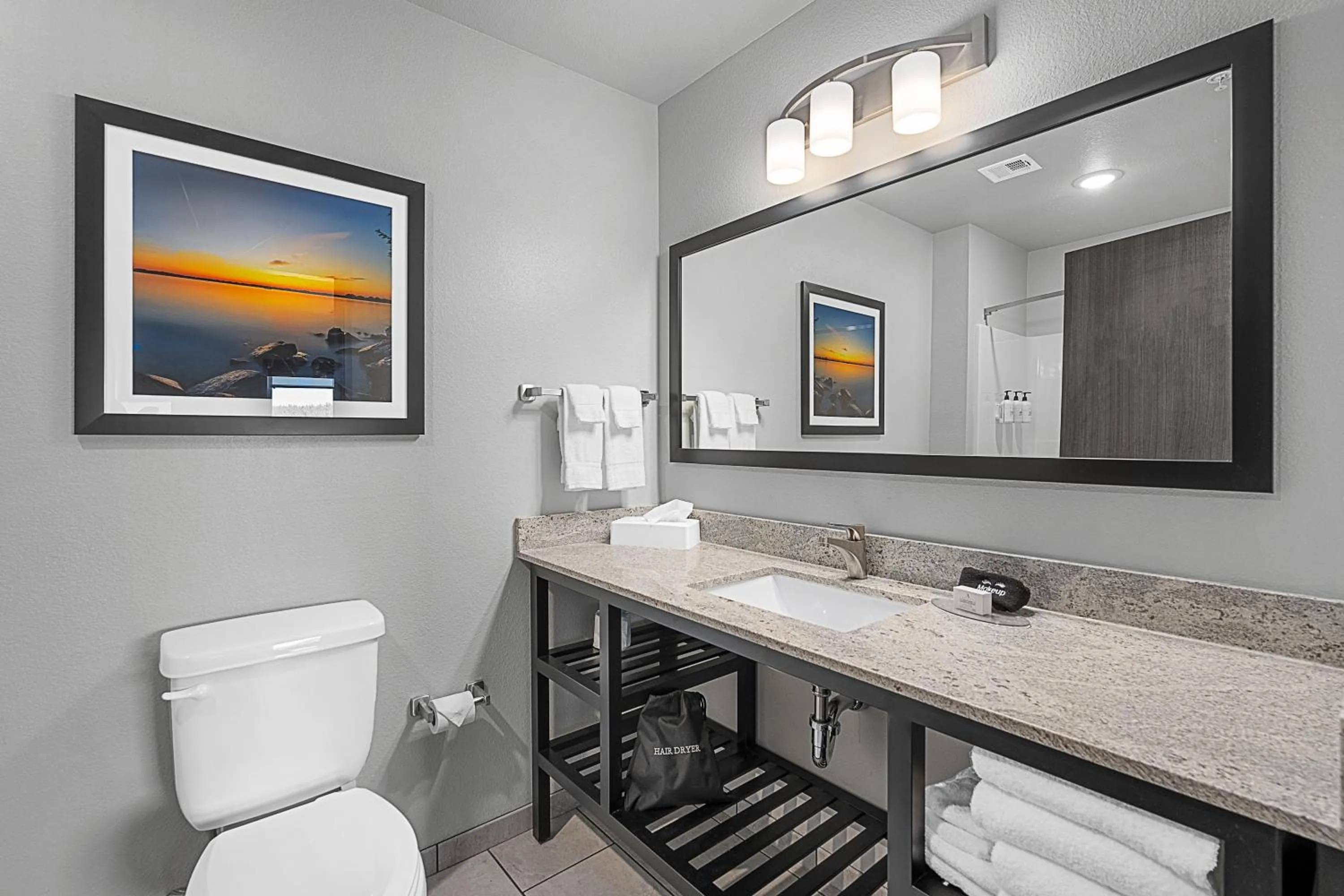 Bathroom in Riverstone Suites by Cobblestone Hotels - Chippewa Falls