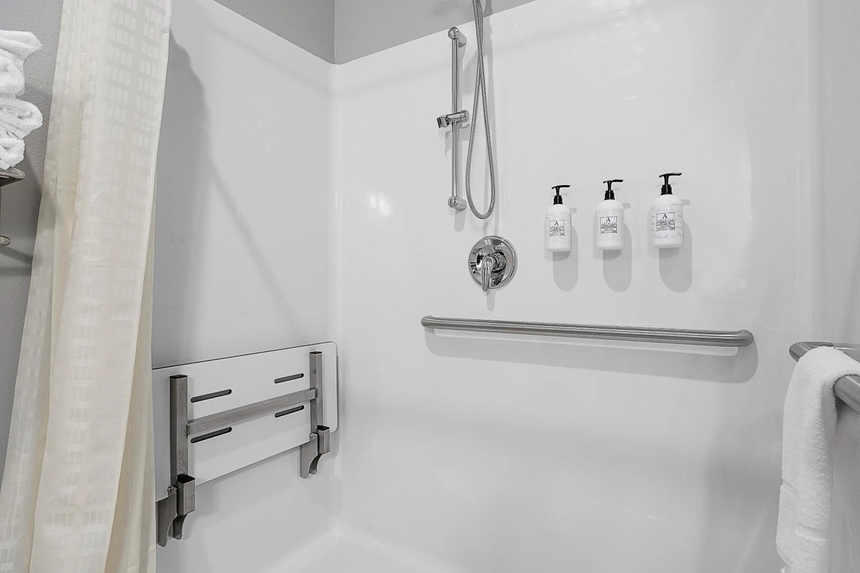 Bathroom in Riverstone Suites by Cobblestone Hotels - Chippewa Falls