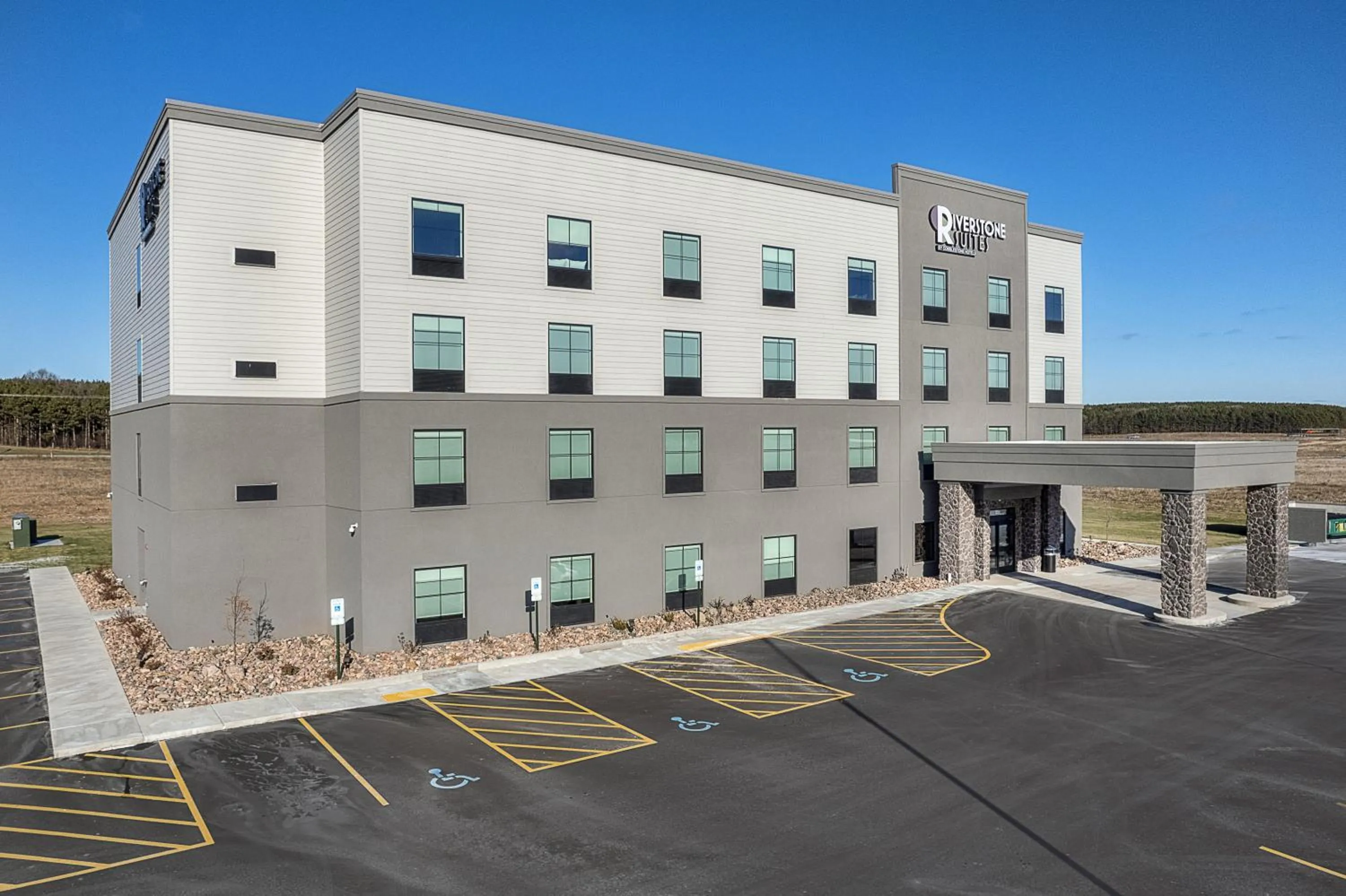 Property building in Riverstone Suites by Cobblestone Hotels - Chippewa Falls