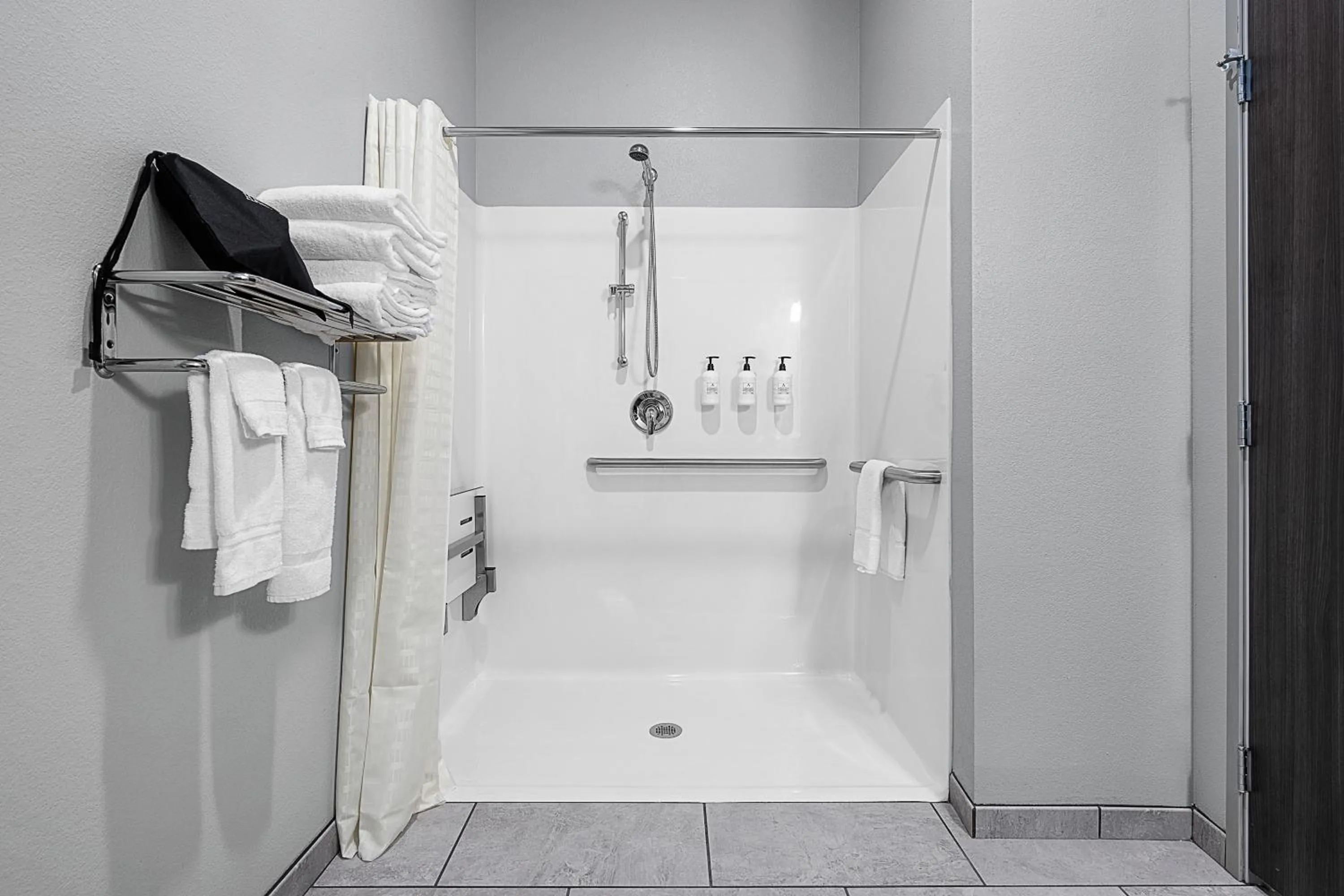 Shower in Riverstone Suites by Cobblestone Hotels - Chippewa Falls