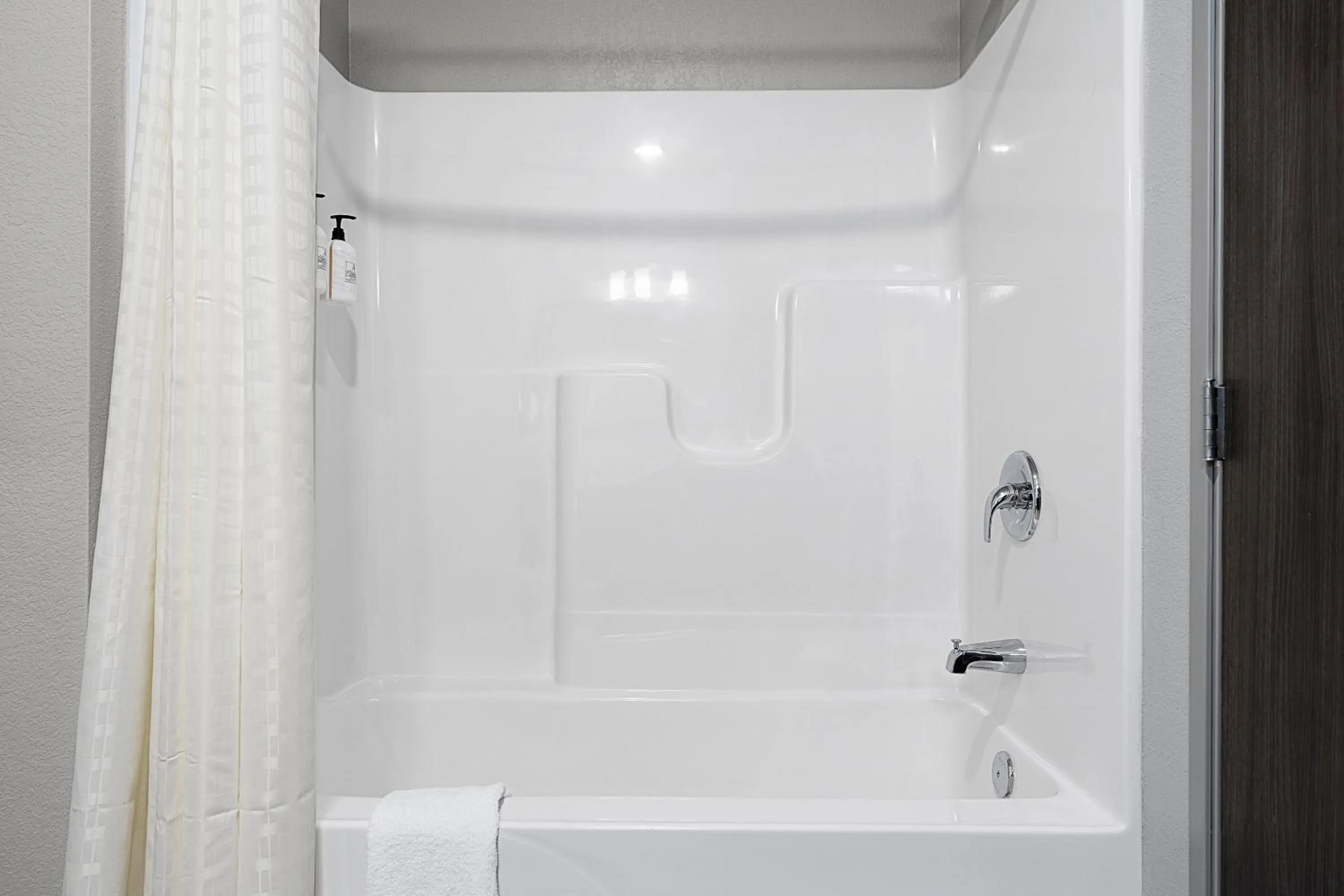 Bathroom in Riverstone Suites by Cobblestone Hotels - Chippewa Falls