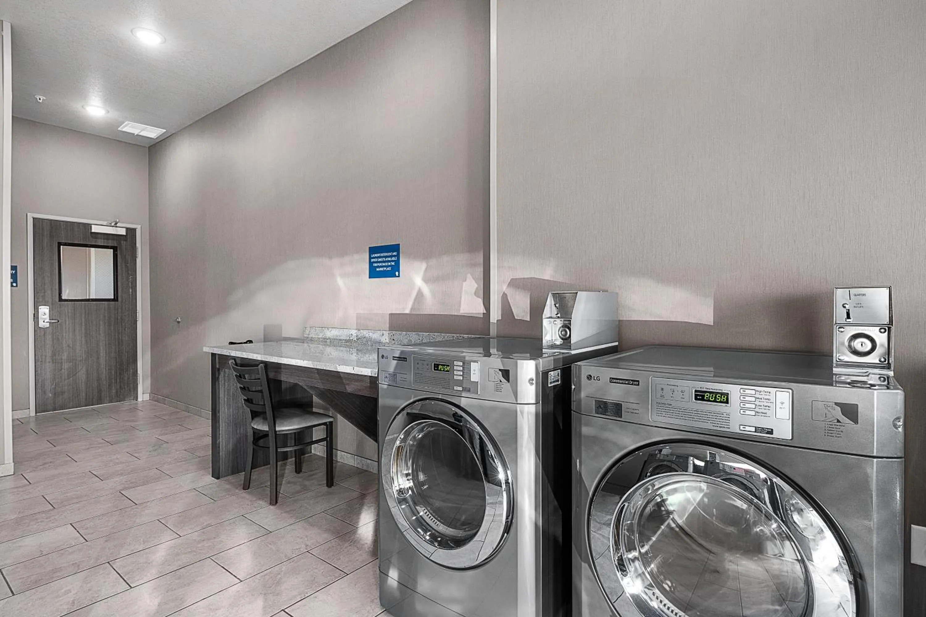 laundry in Riverstone Suites by Cobblestone Hotels - Chippewa Falls