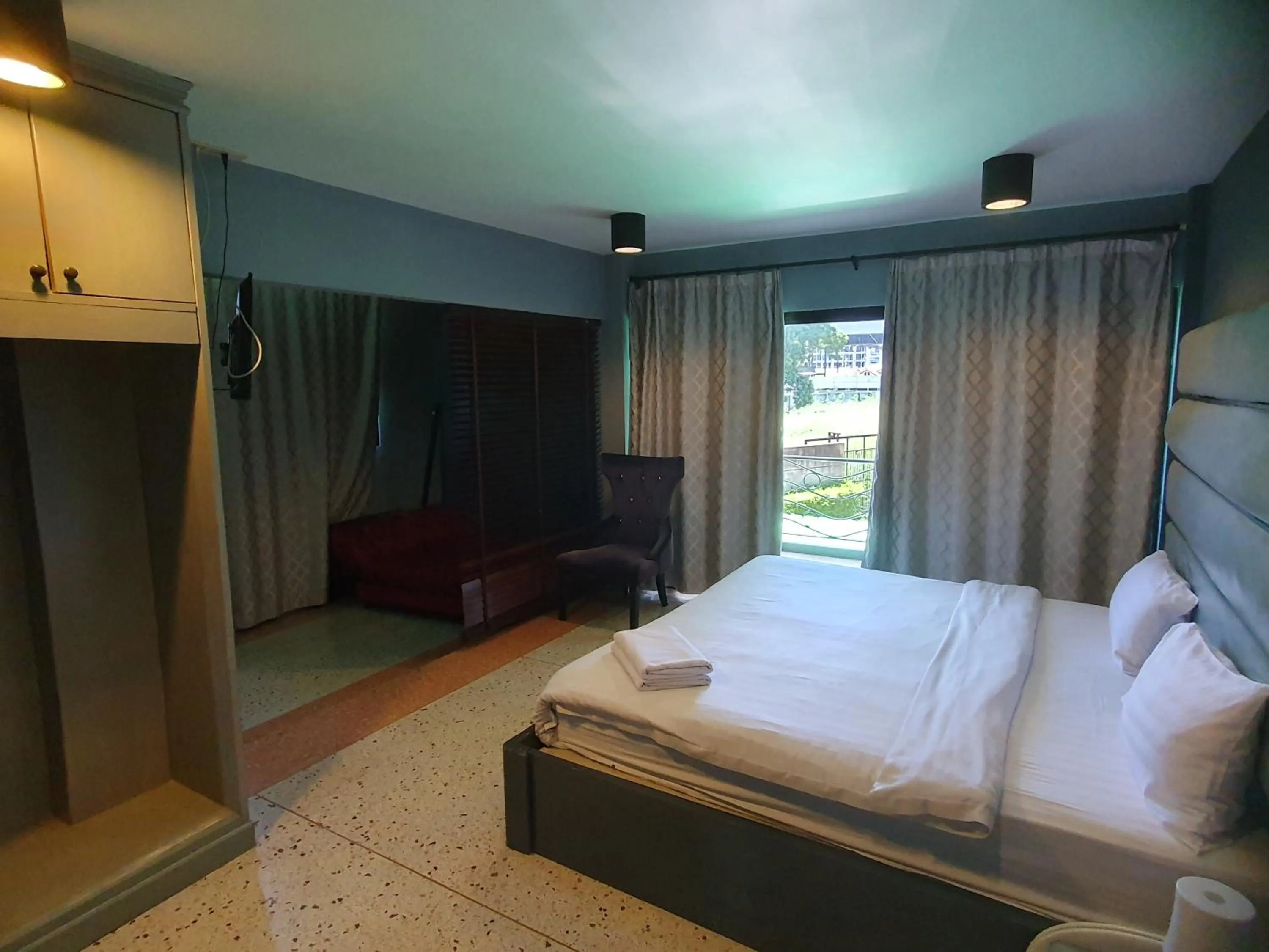 Bed in Momento Resort