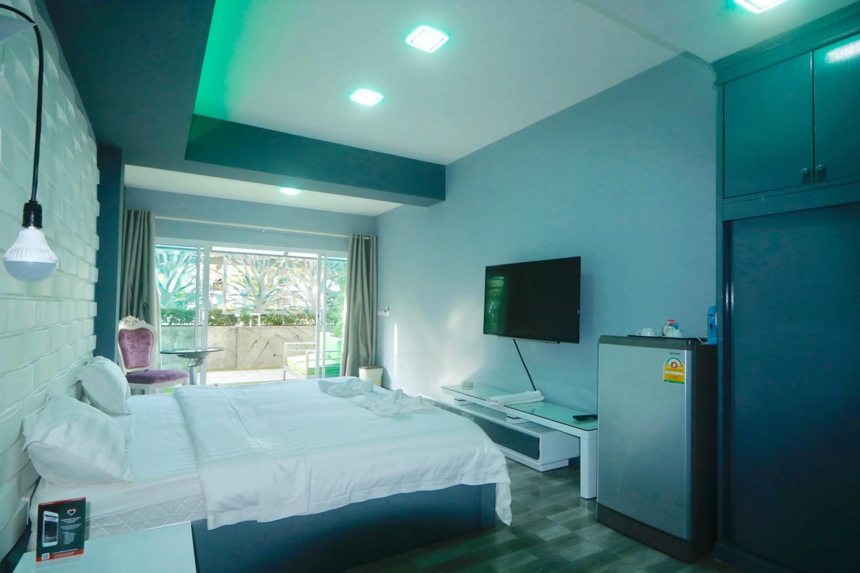 Bed in Momento Resort