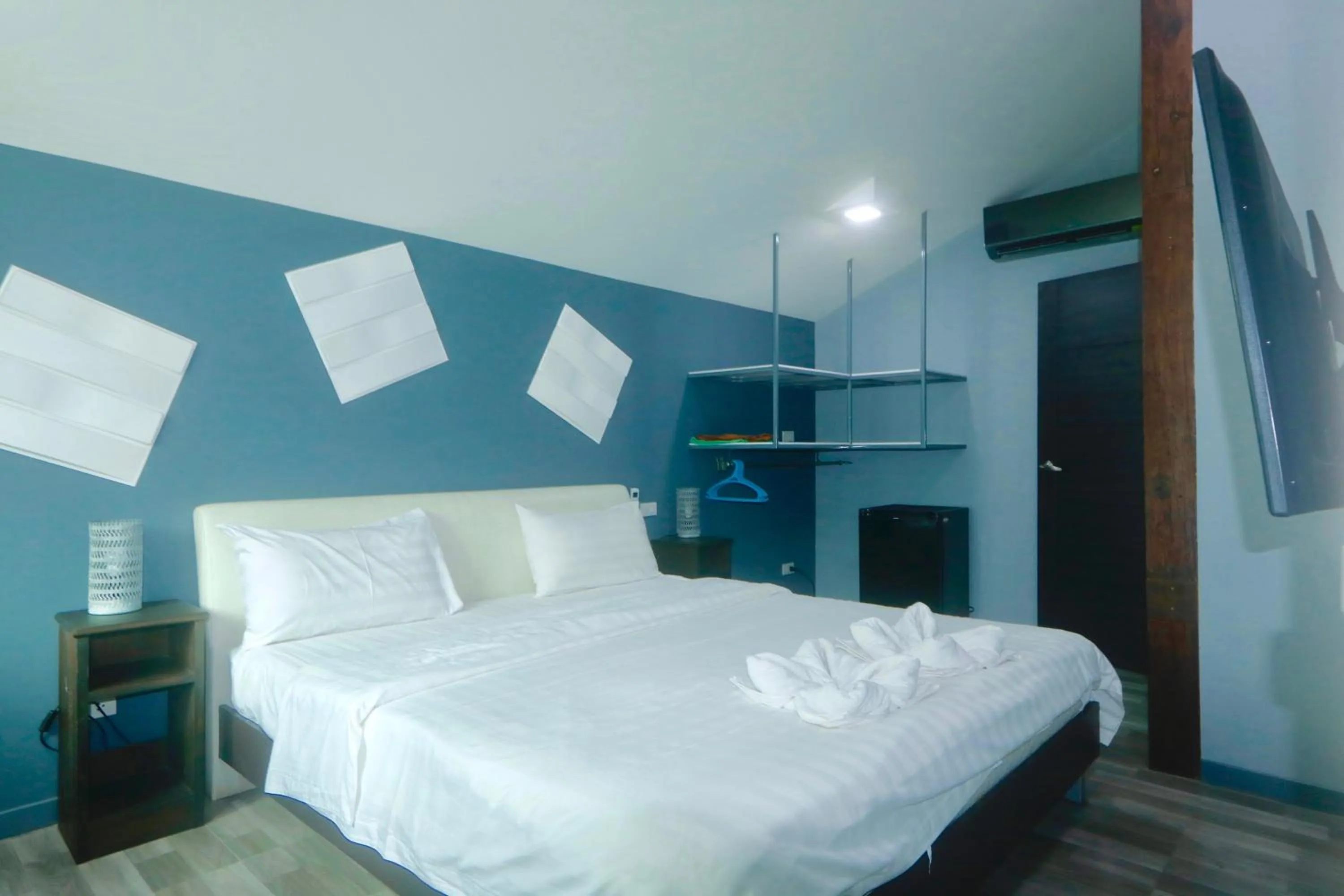 Bed in Momento Resort