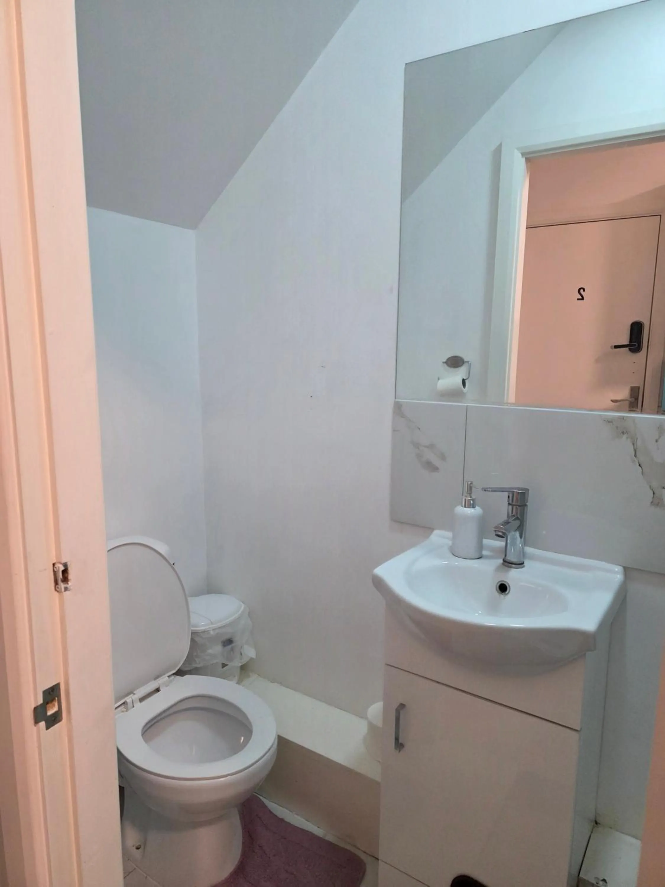 Bathroom in Baraka House Royal Victoria London by OYO