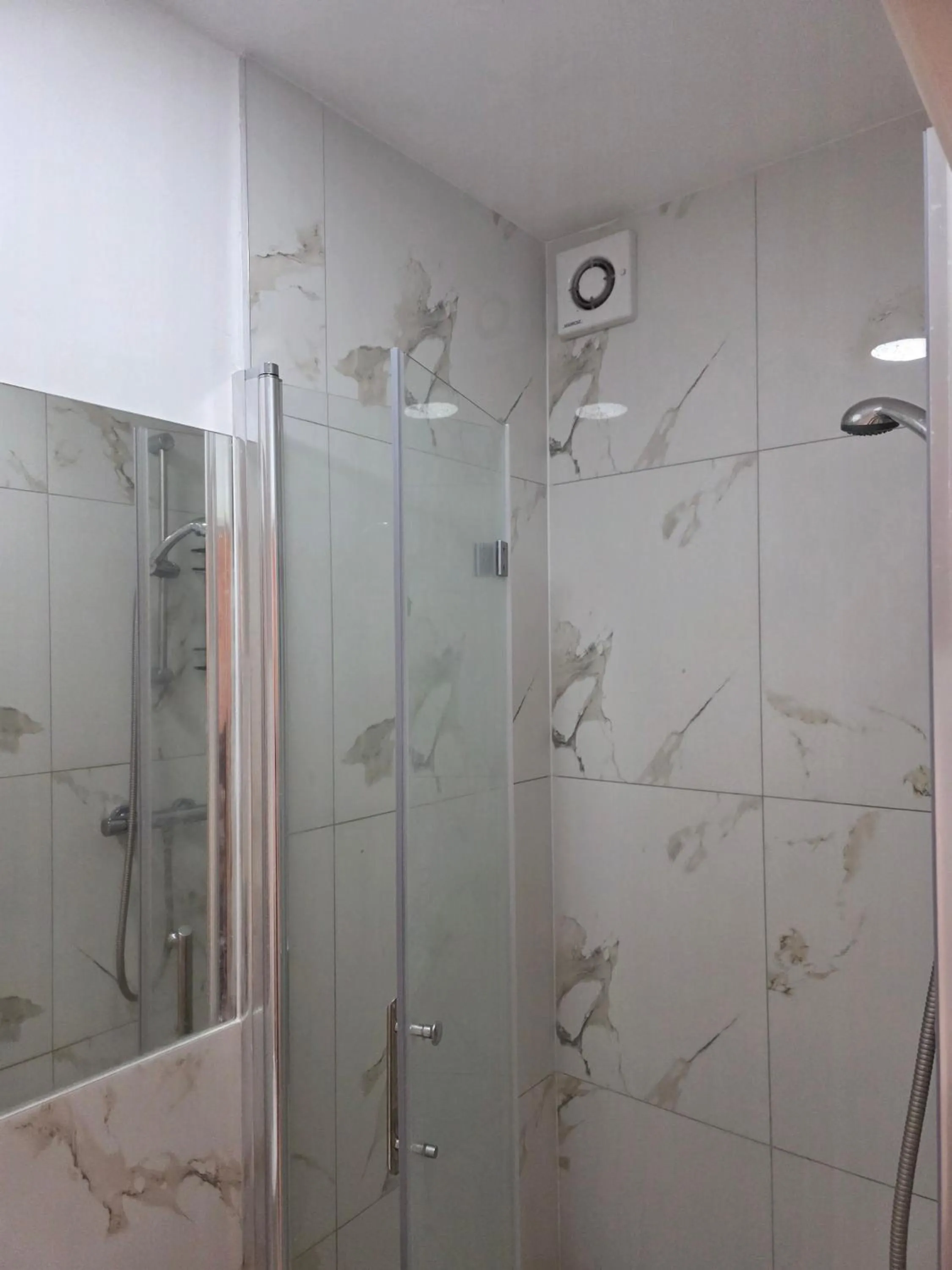 Bathroom in Baraka House Royal Victoria London by OYO