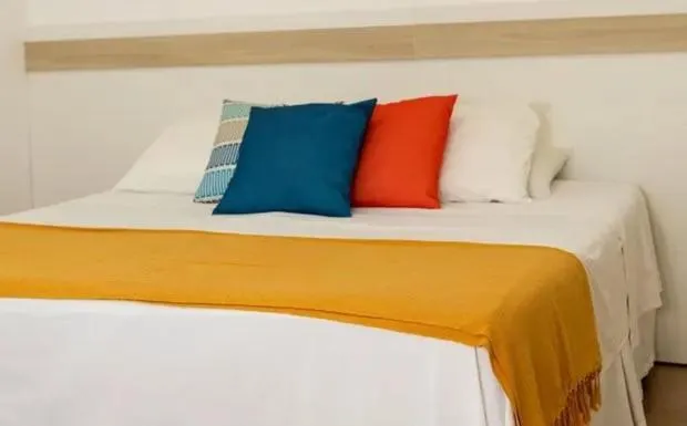 Bed in Hotel Maricá