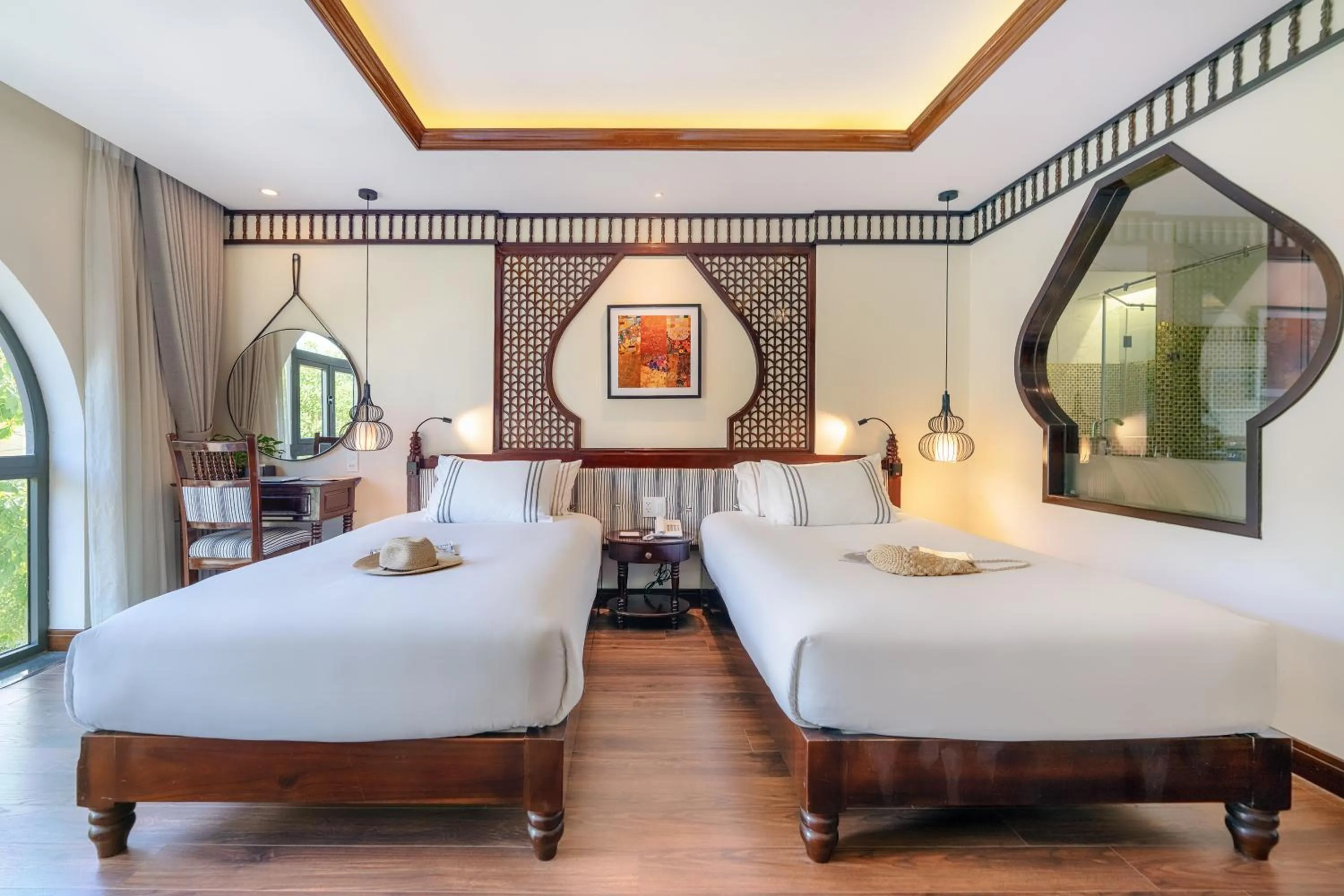 Bed in Qualia De Hôtel Hoi An - Rooftop Bar City View