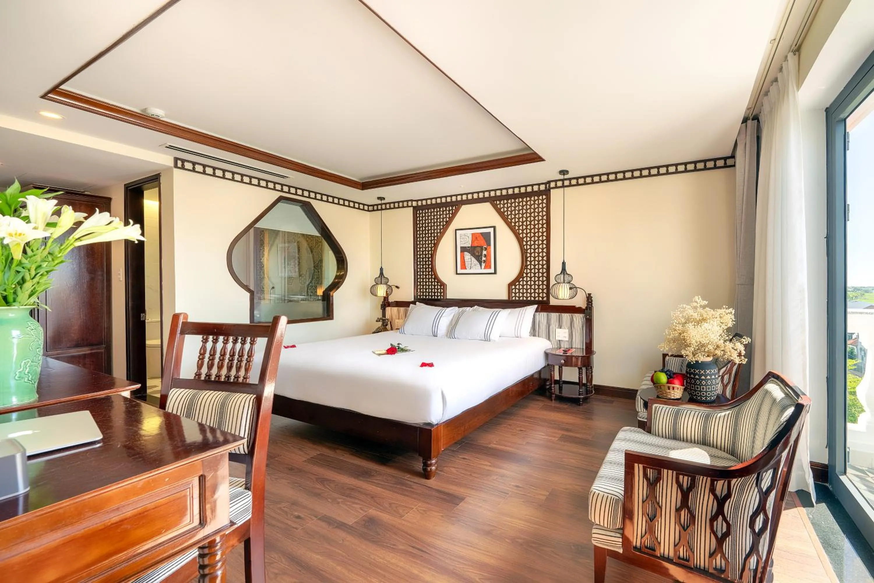 Bed in Qualia De Hôtel Hoi An - Rooftop Bar City View