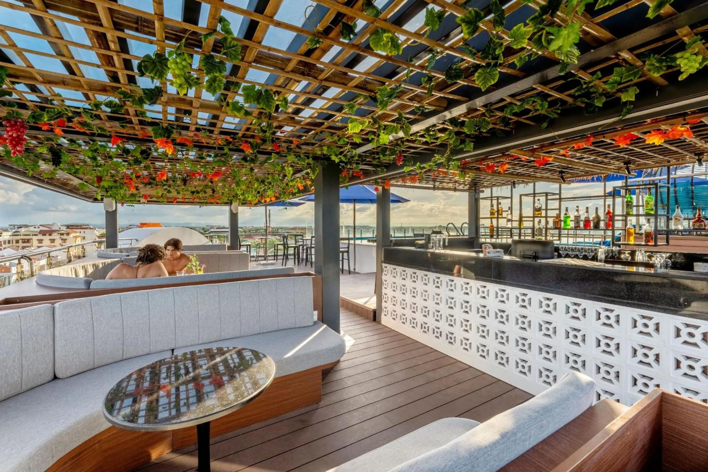 People in Qualia De Hôtel Hoi An - Rooftop Bar City View